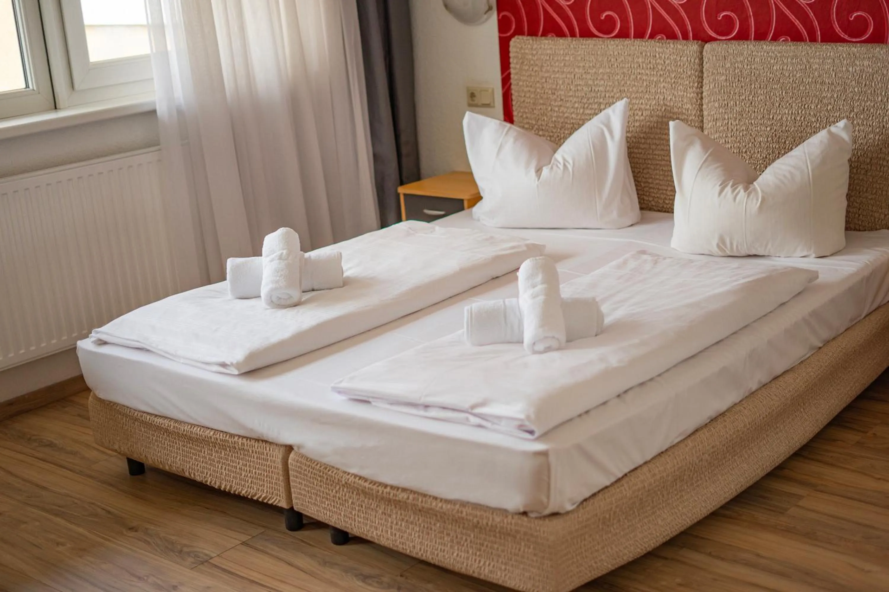 Bed in Self-Check-In Hotel Constantin