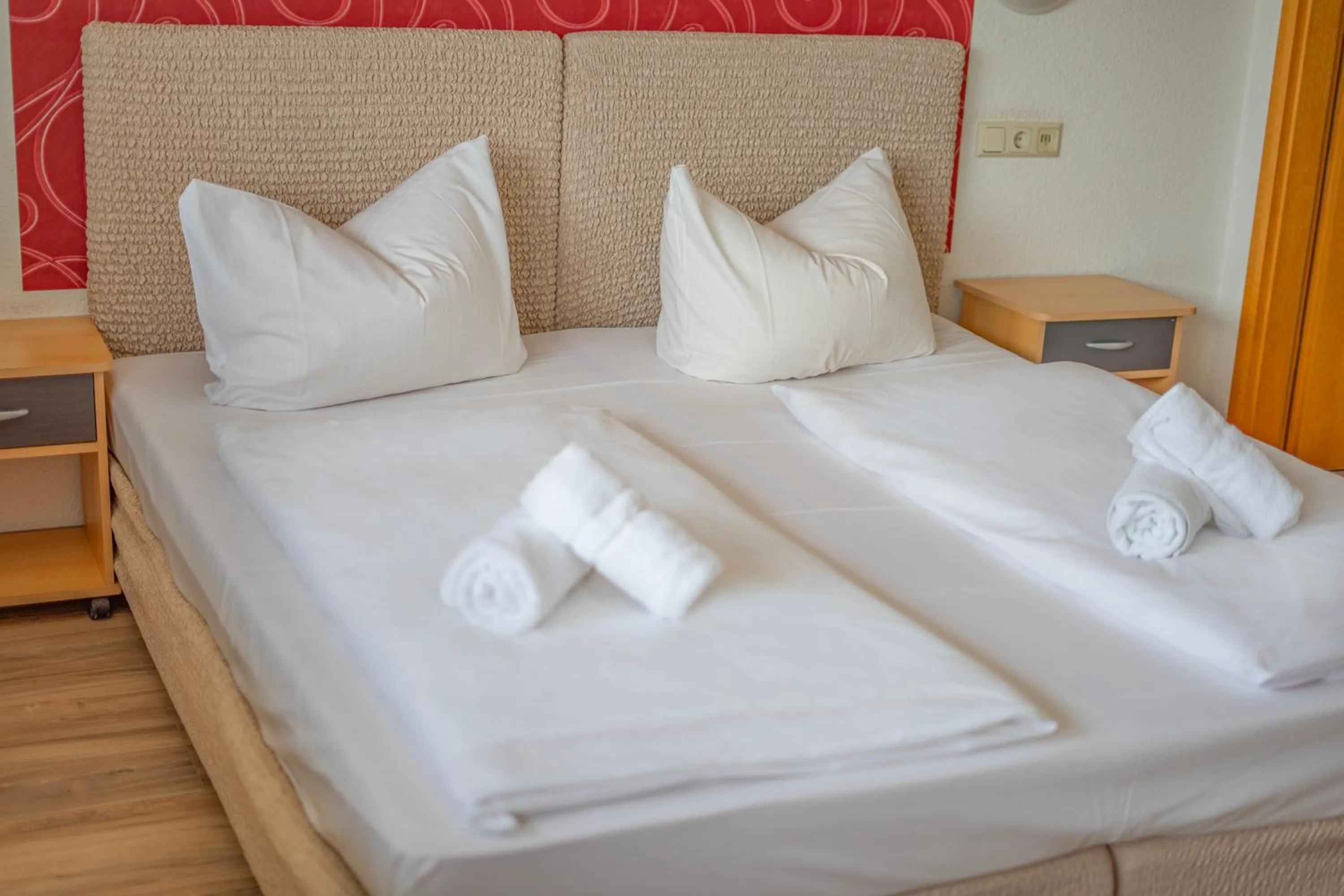 Bed in Self-Check-In Hotel Constantin