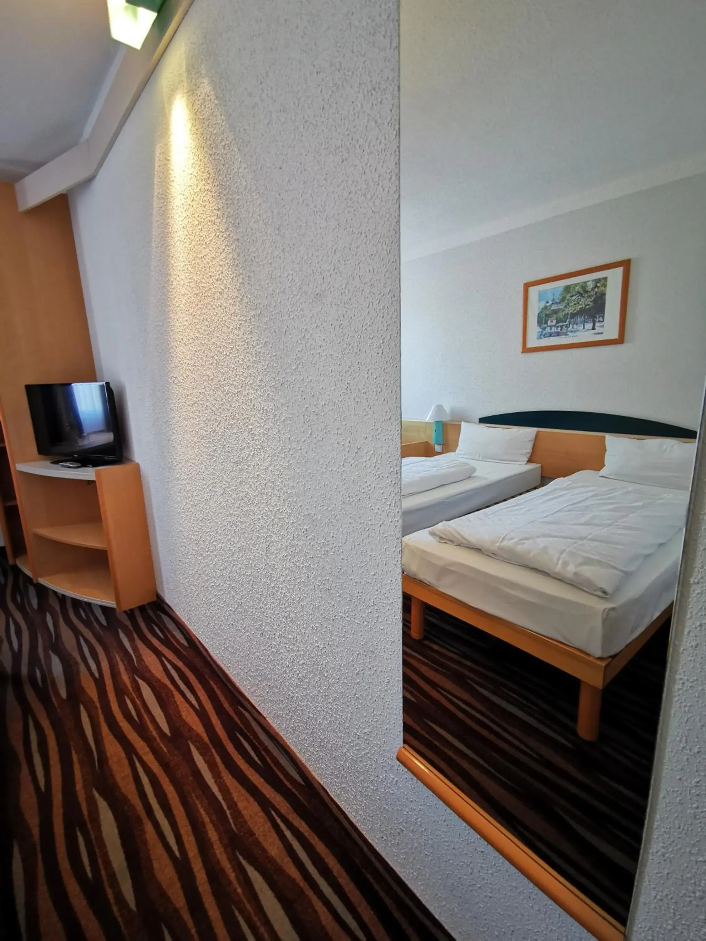 Bed in Plaza Inn Berlin Süd Ludwigsfelde Bed in Plaza Inn Berlin Süd Ludwigsfelde