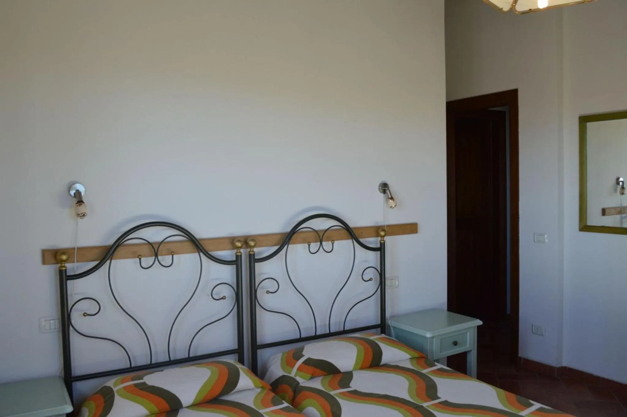 Bedroom in Holidays in apartment with swimming pool in Tuscany Siena