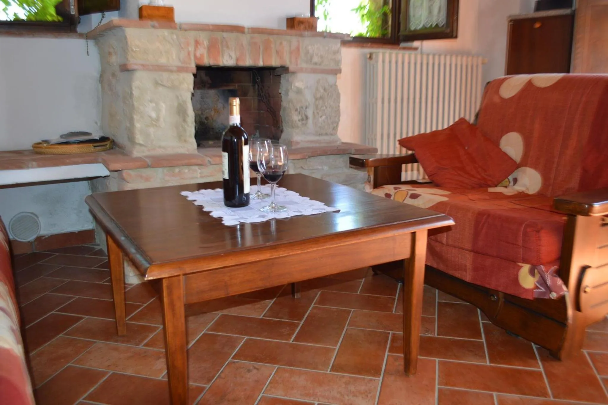Communal lounge/ TV room in Holidays in apartment with swimming pool in Tuscany Siena