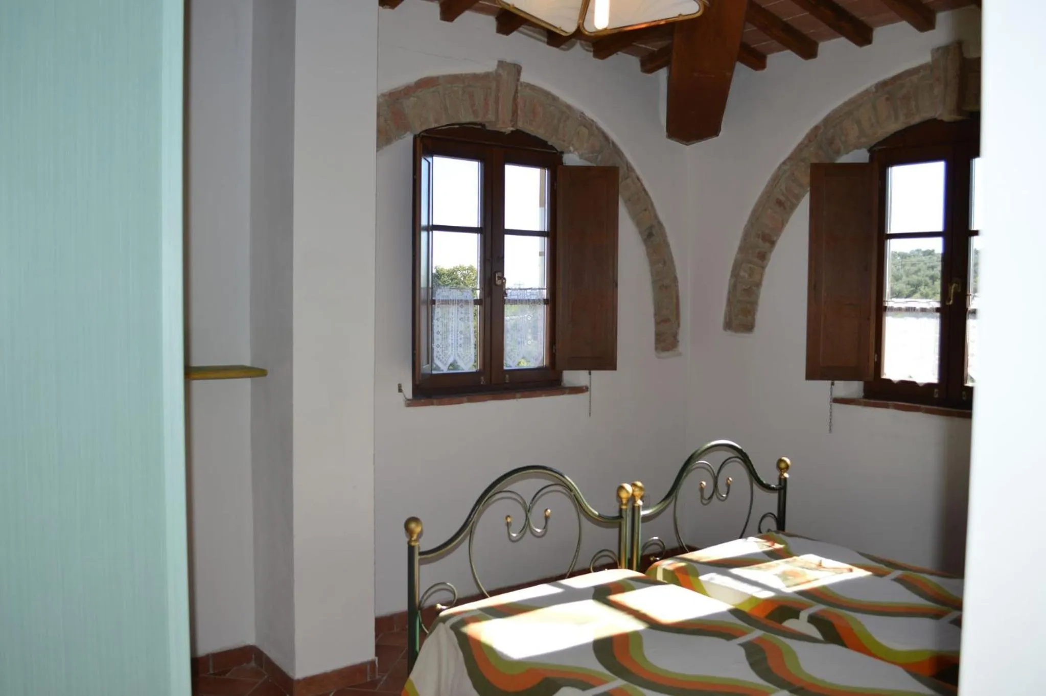 Bedroom in Holidays in apartment with swimming pool in Tuscany Siena