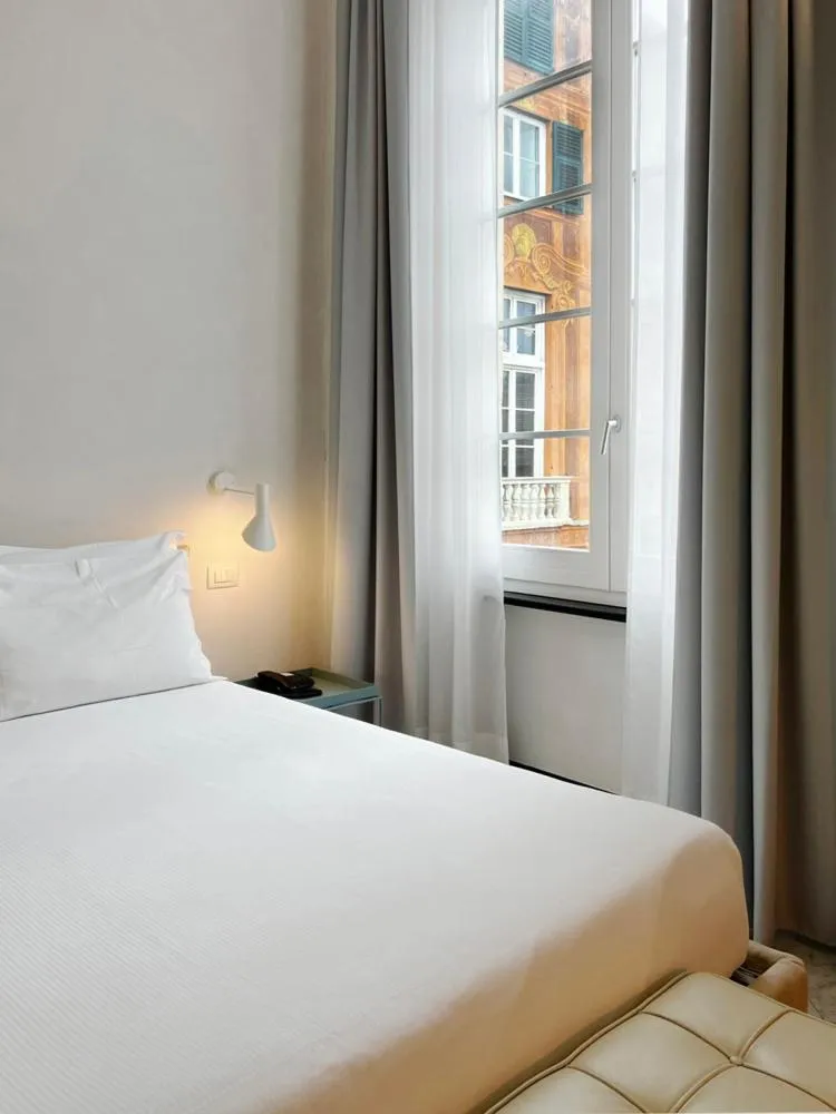 Bed in Hotel Le Nuvole Residenza d'Epoca