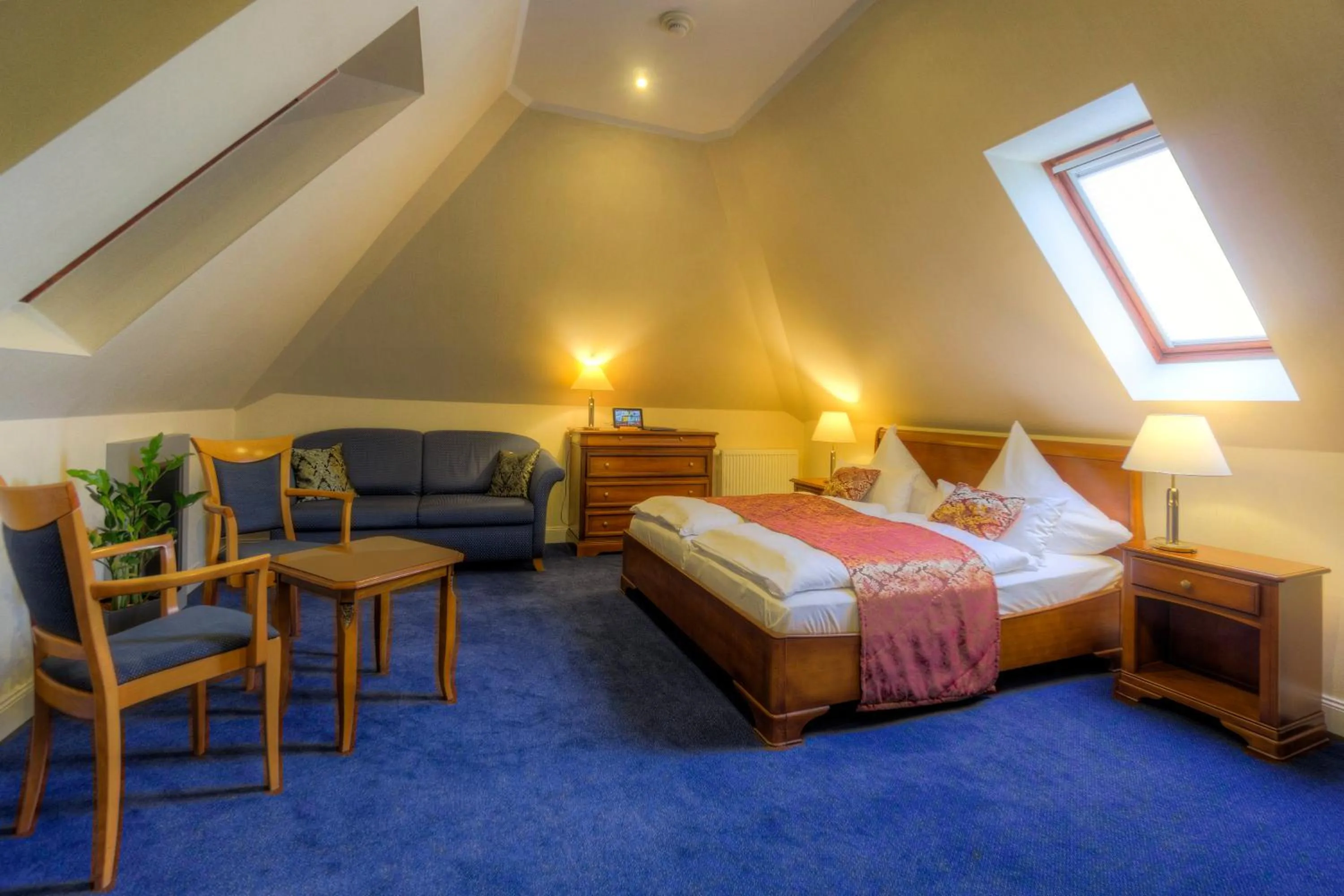 Photo of the whole room, Bed in KurparkHotel Warnemünde