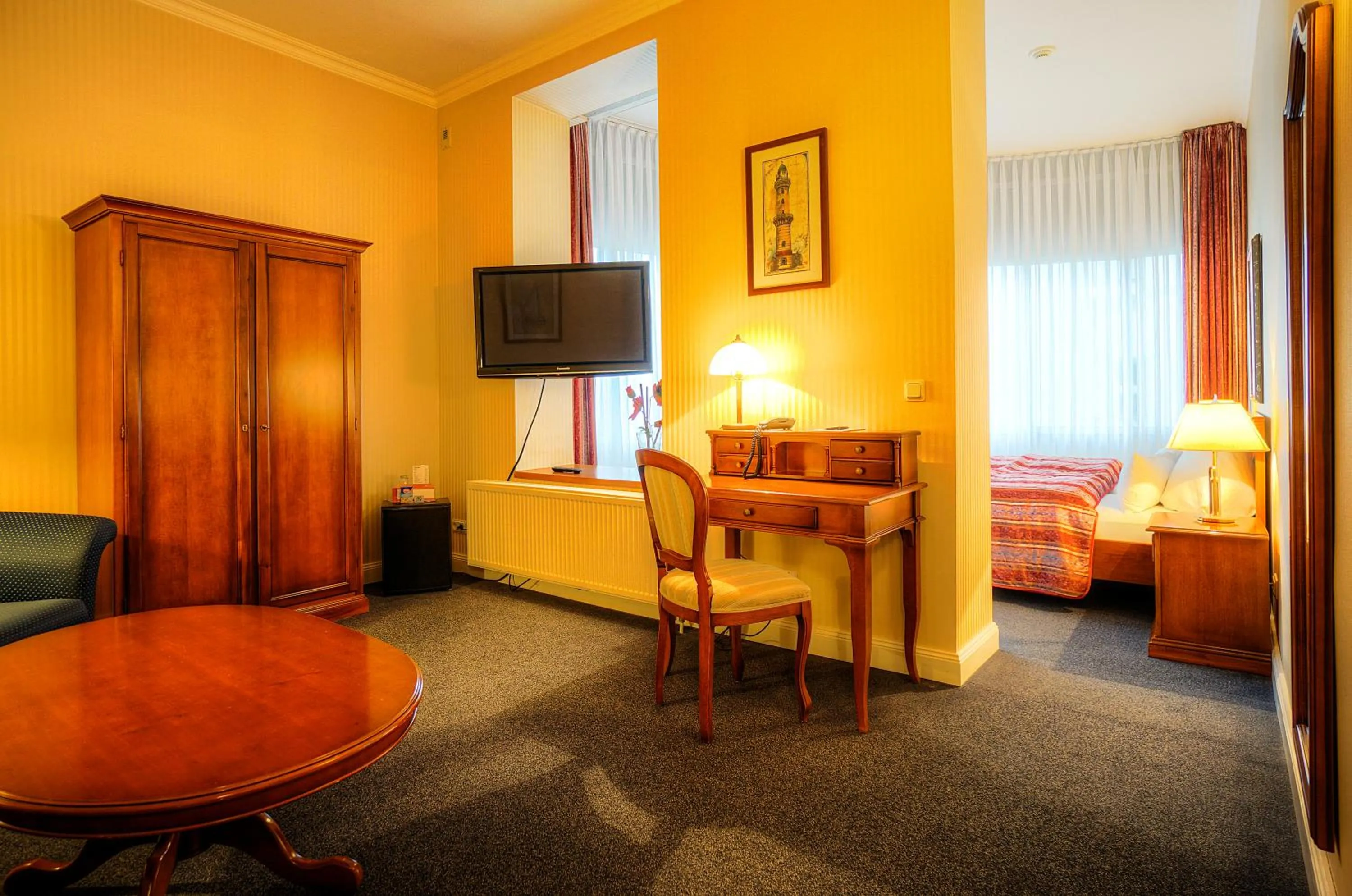 Photo of the whole room, Bed in KurparkHotel Warnemünde