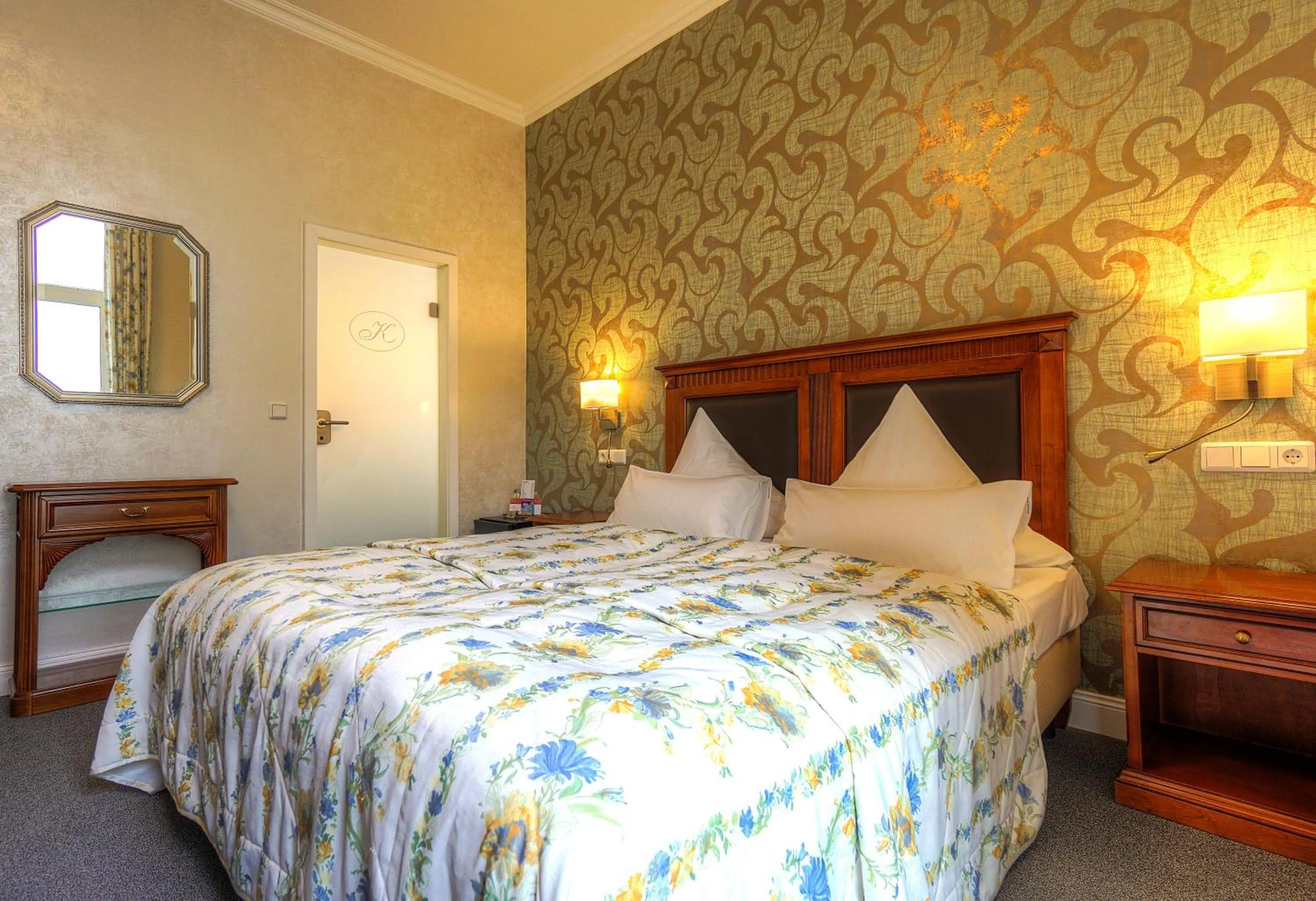 Bedroom, Bed in KurparkHotel Warnemünde