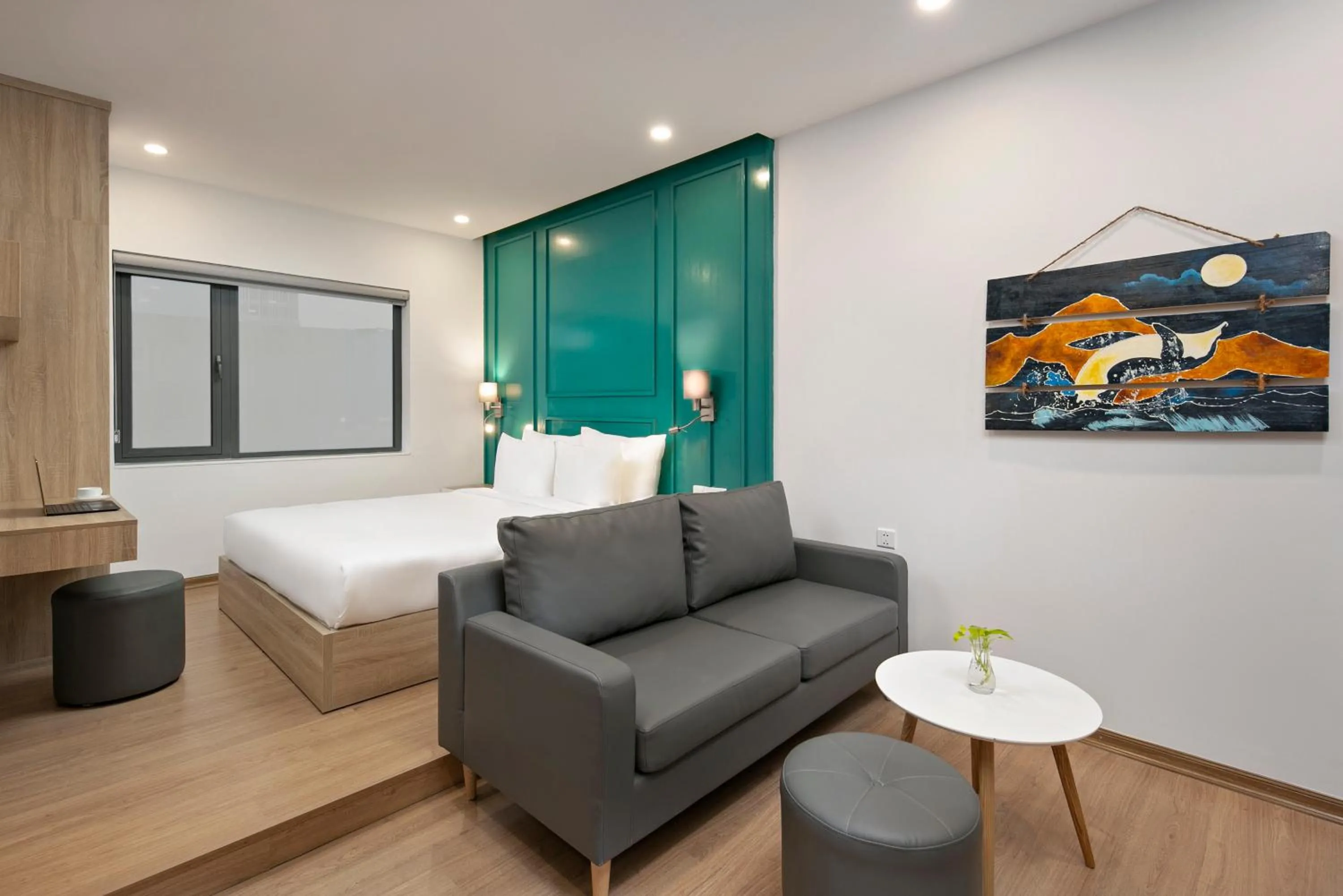 Living room, Bed in Dolphin Hotel and Apartment