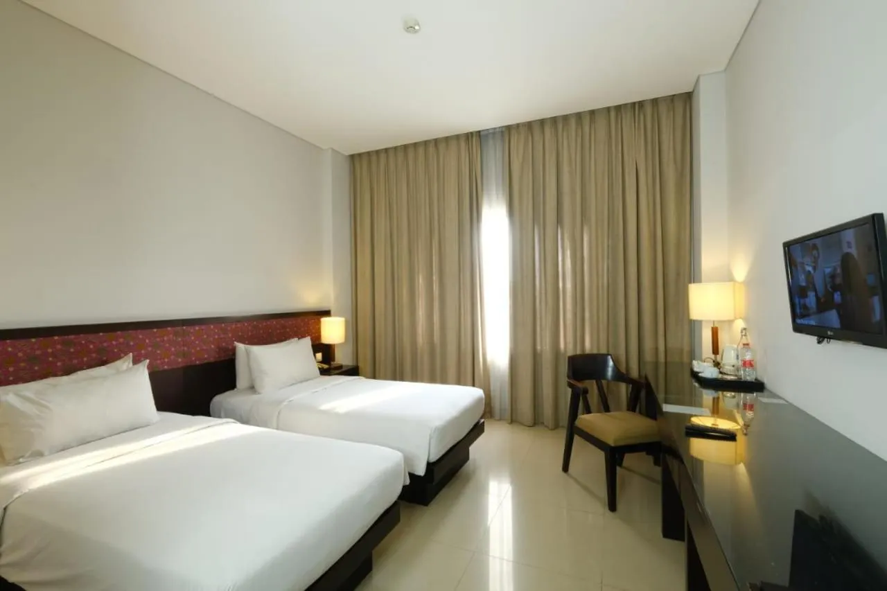 Bed in Hotel Surya Yudha Purwokerto