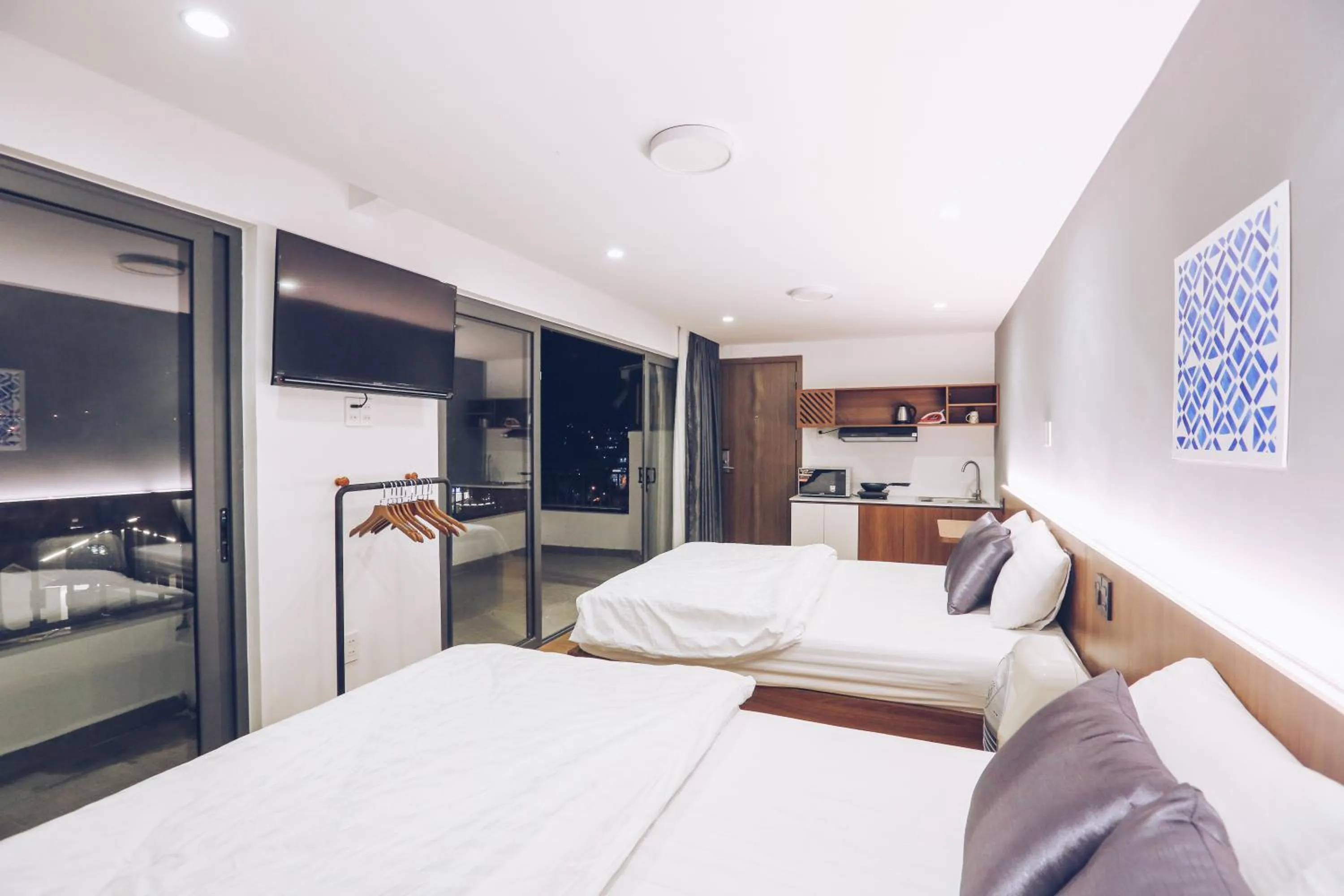 Bed in TTR Studio Apart Hotel