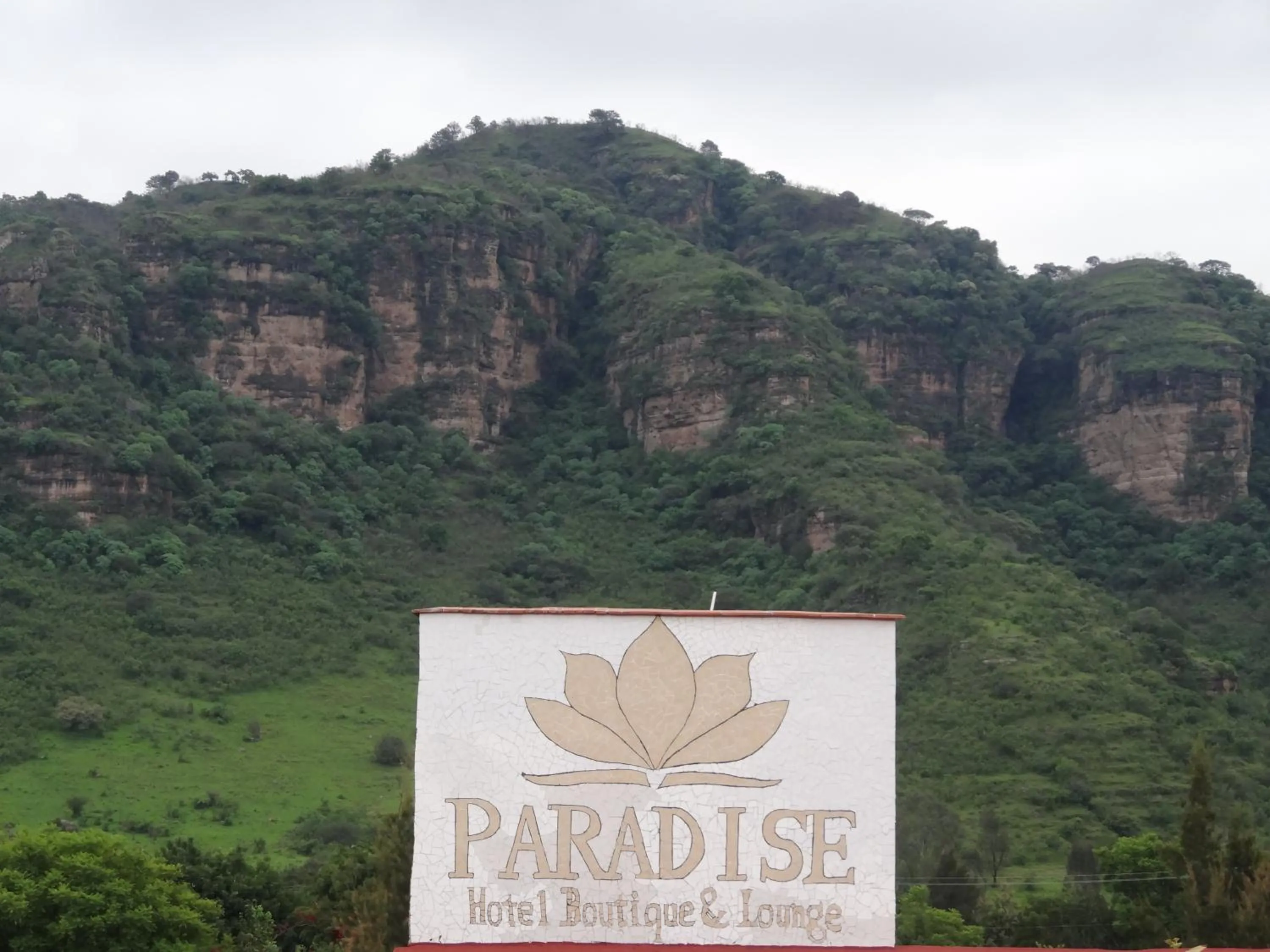 Property logo or sign in Paradise Hotel Boutique & Lounge