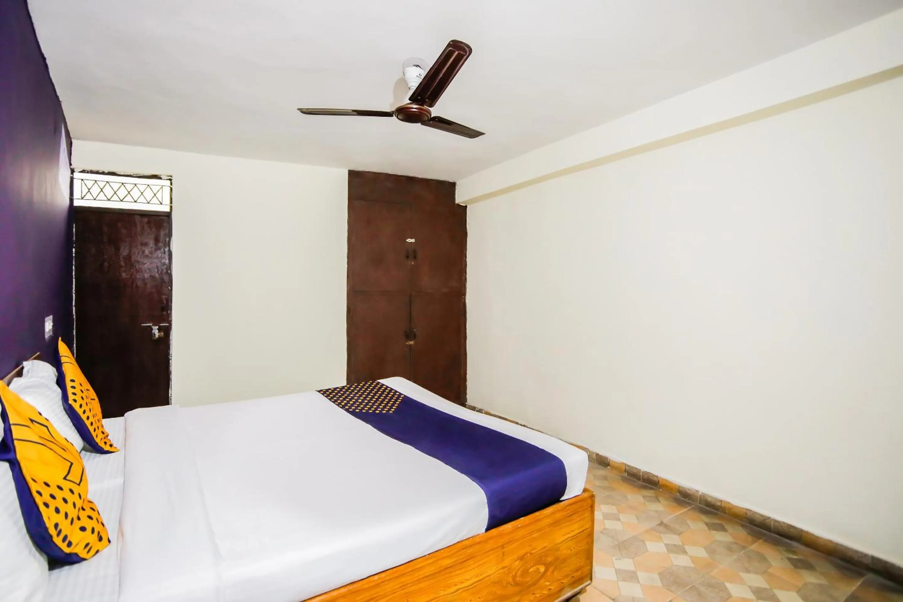 Bedroom, Bed in SPOT ON Hotel Harry's 1 Near Select Citywalk Mall