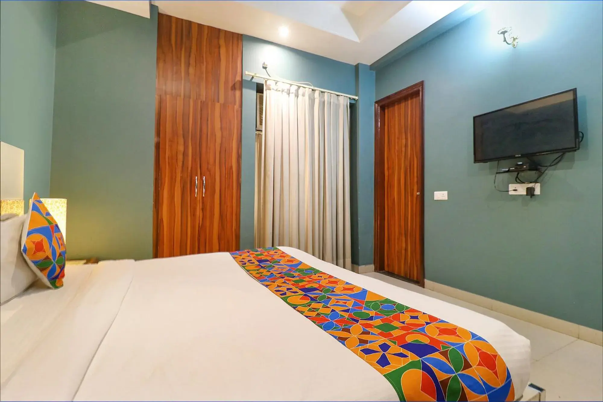 Bed in FabHotel Maxx Inn Bed in FabHotel Maxx Inn