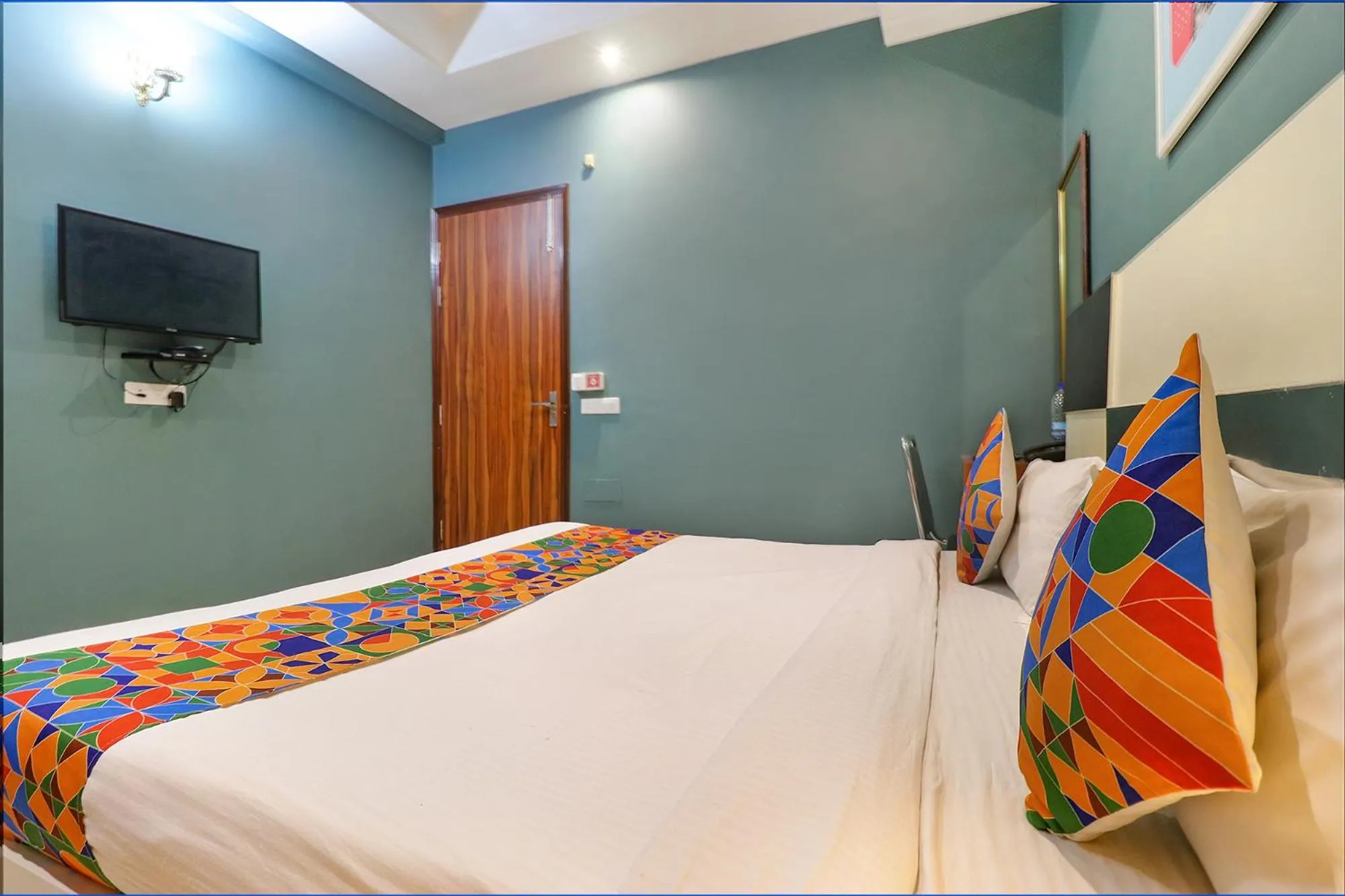 Bed in FabHotel Maxx Inn