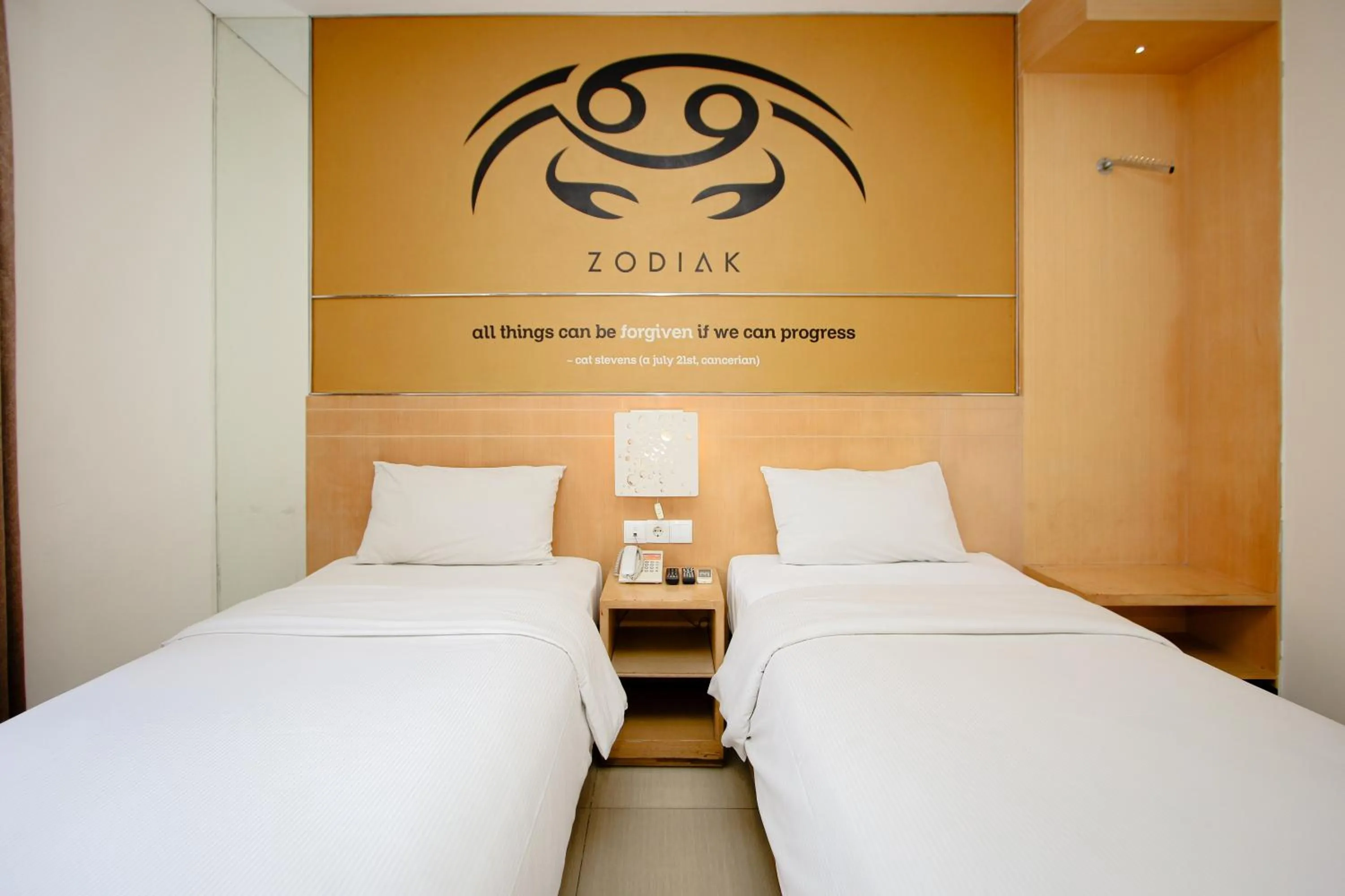 Bed in Zodiak Asia Afrika by KAGUM Hotels