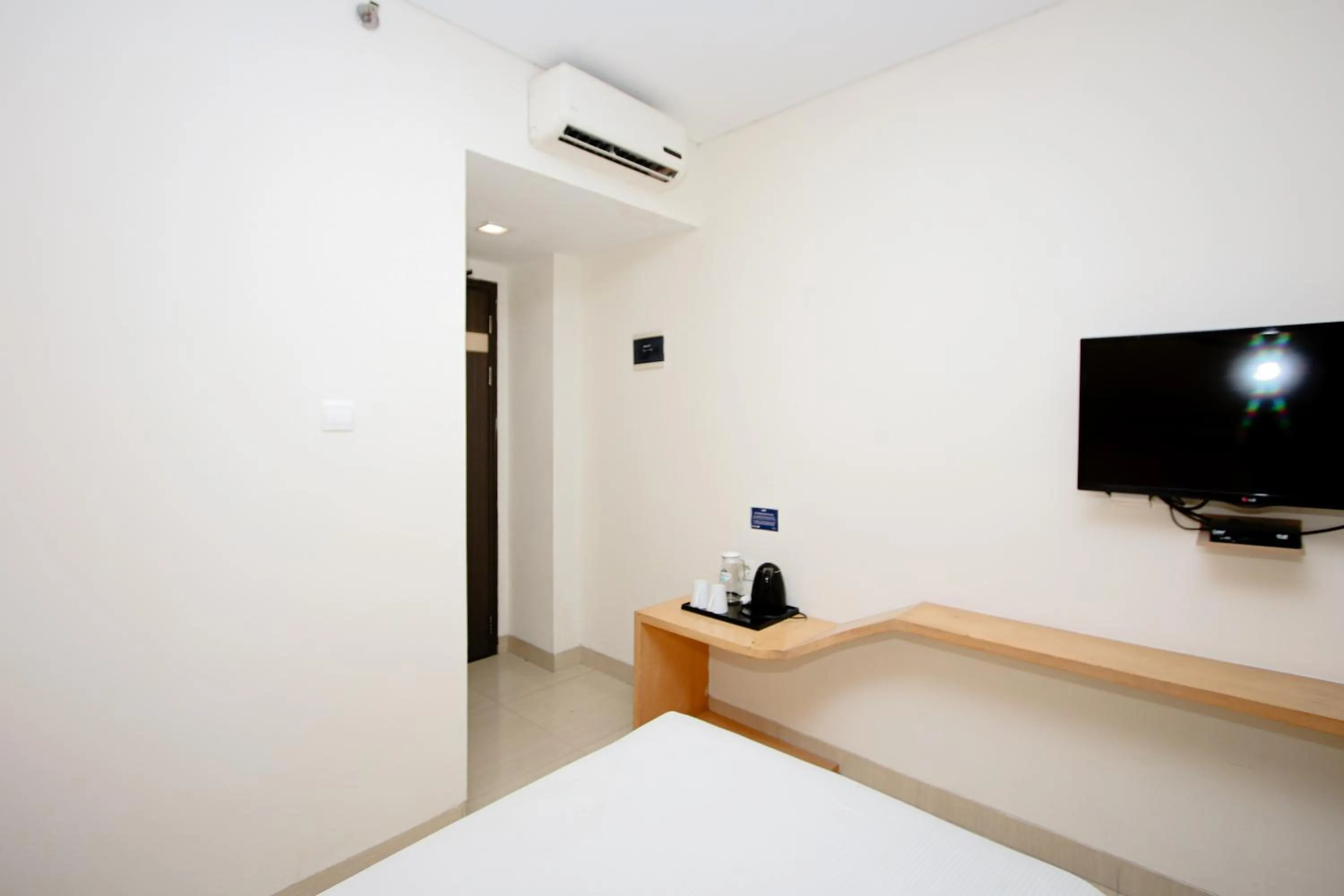 Bed in Zodiak Asia Afrika by KAGUM Hotels