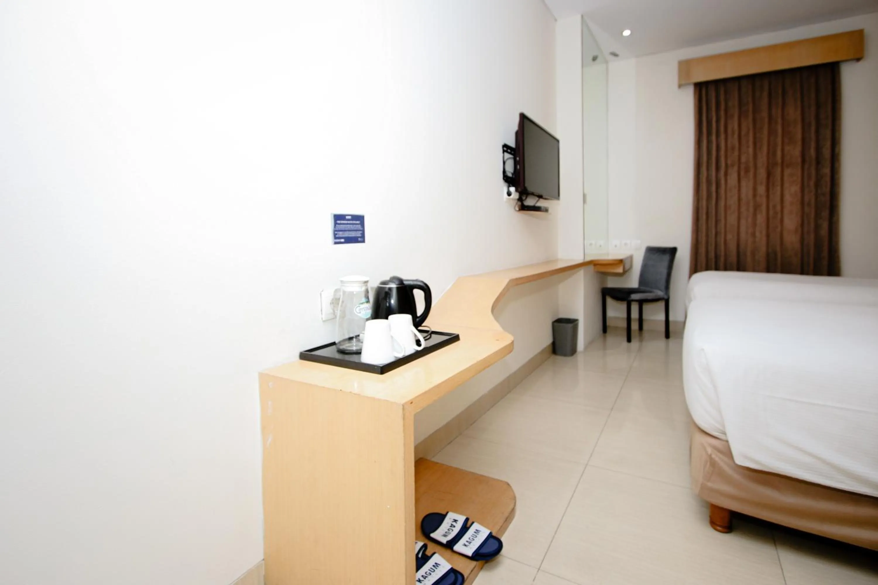 Bed in Zodiak Asia Afrika by KAGUM Hotels