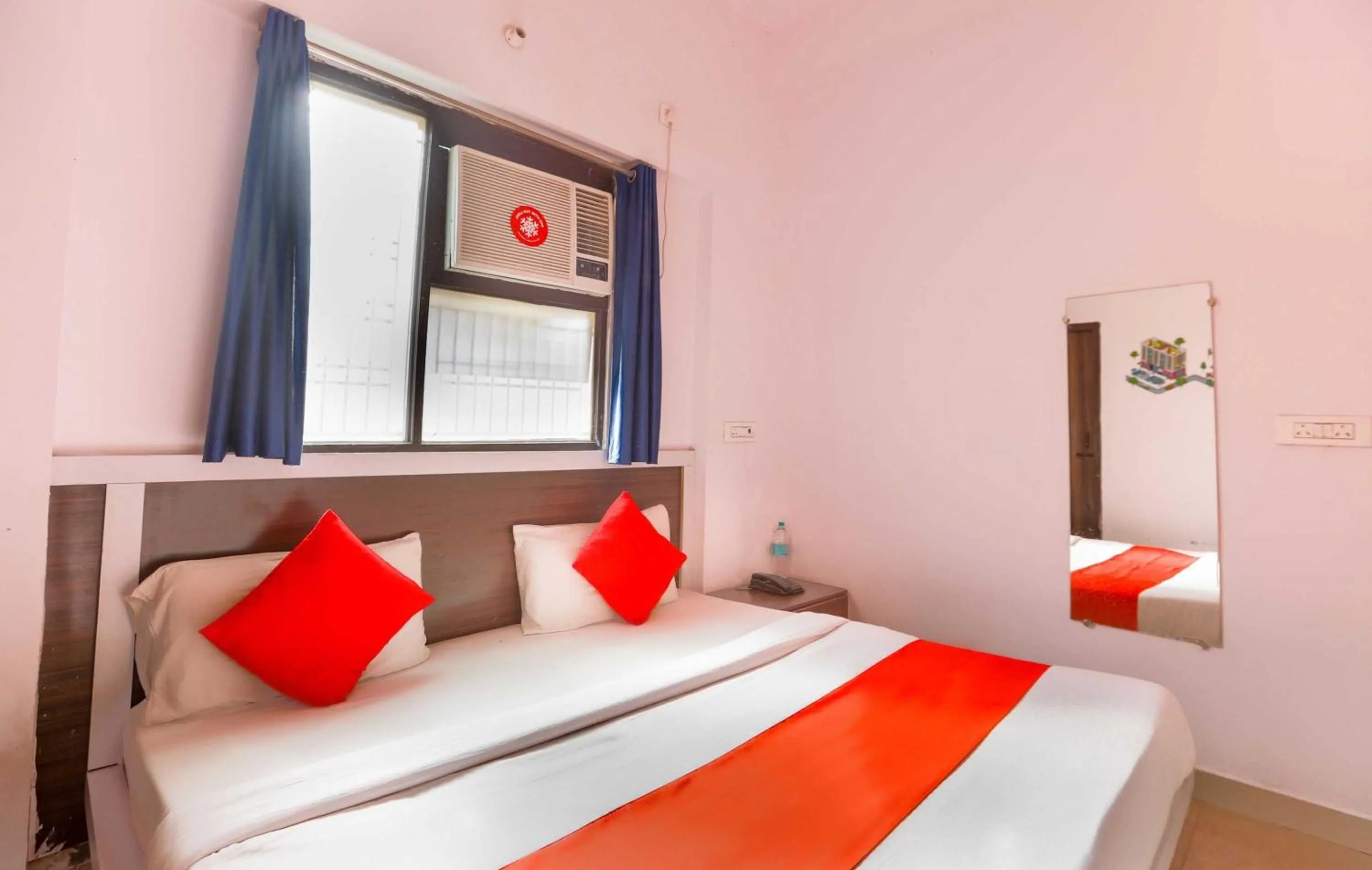 Bedroom in Hotel O Noida Villa