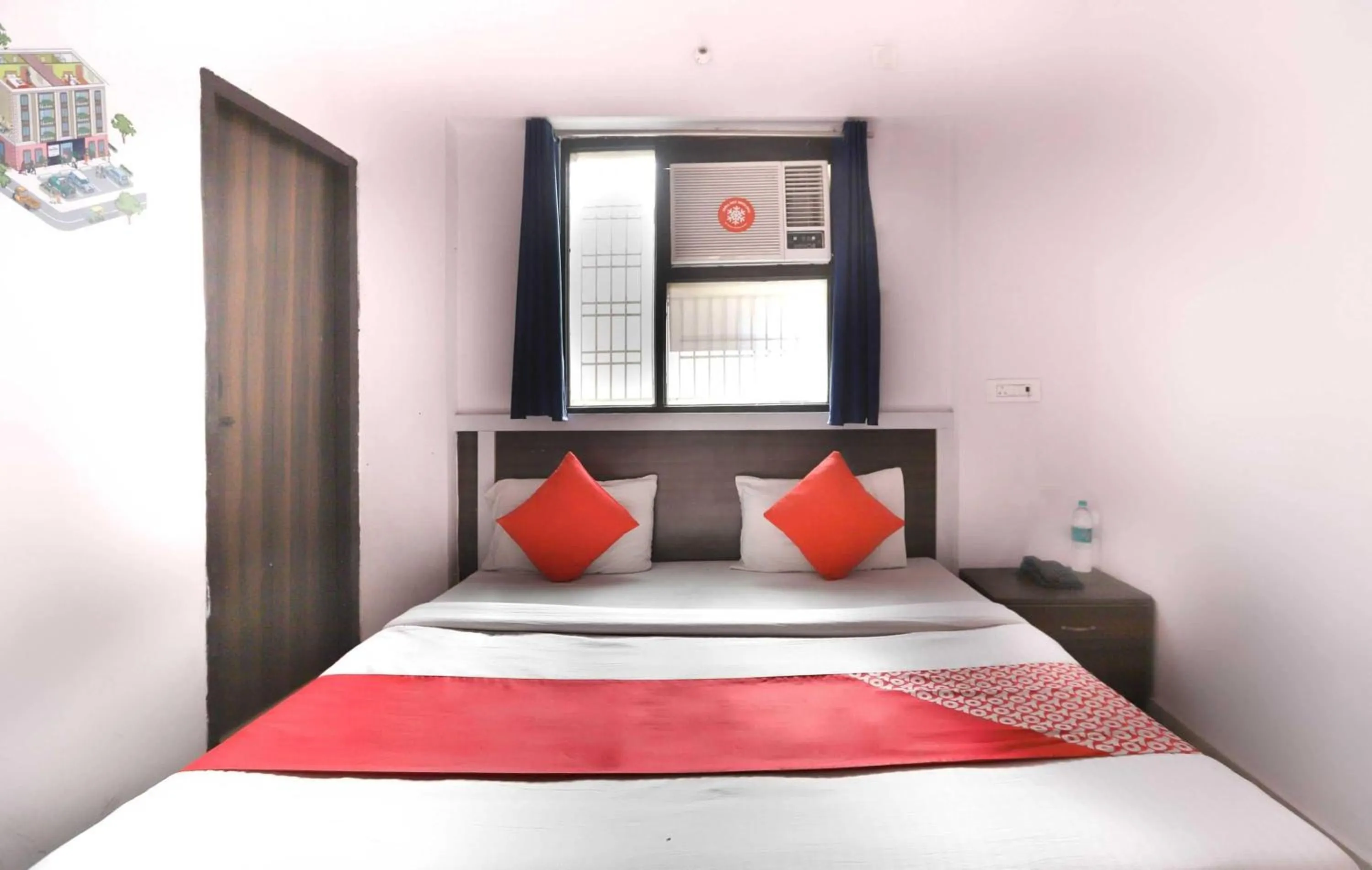 Bedroom in Hotel O Noida Villa