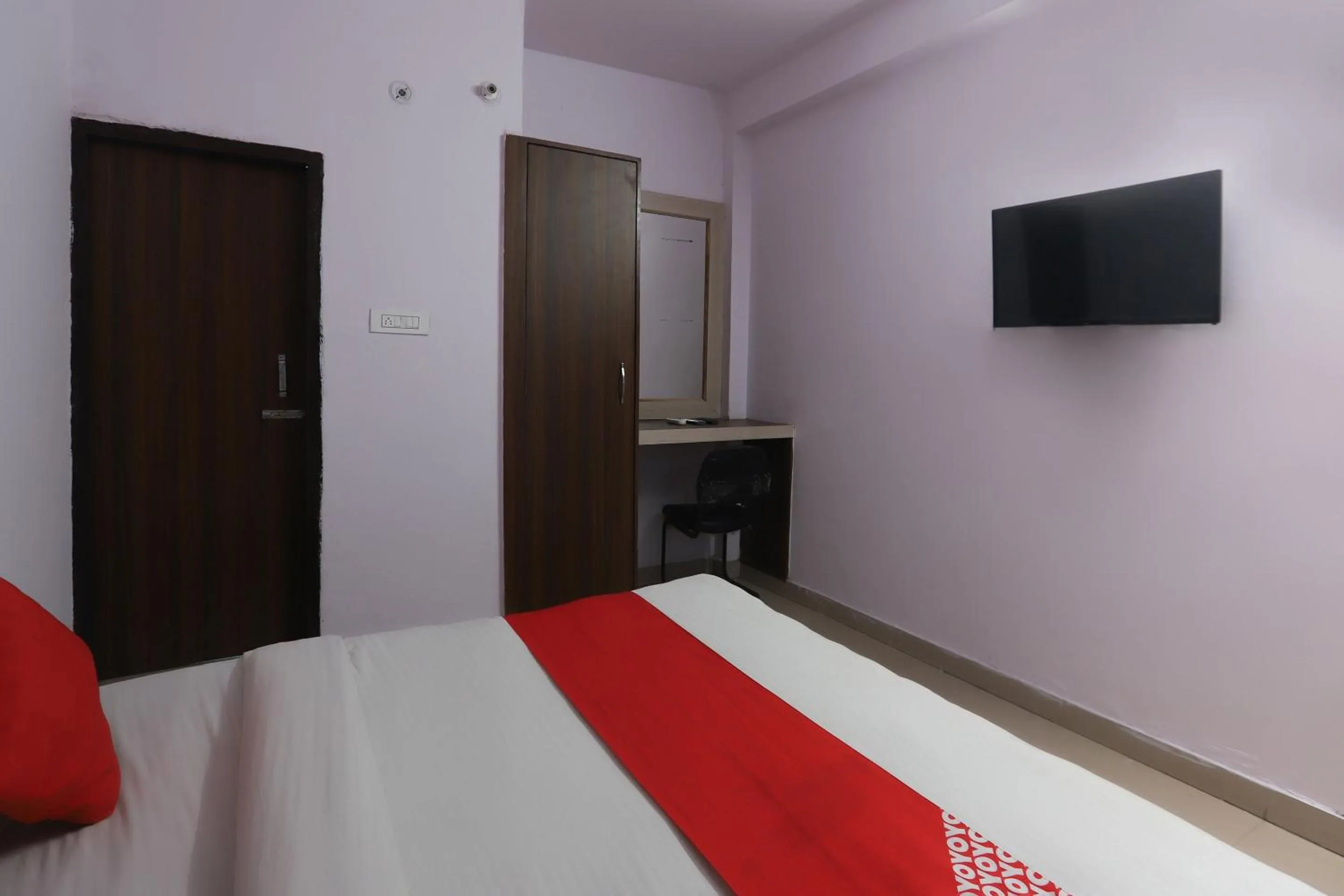 Bedroom in Hotel O Noida Villa