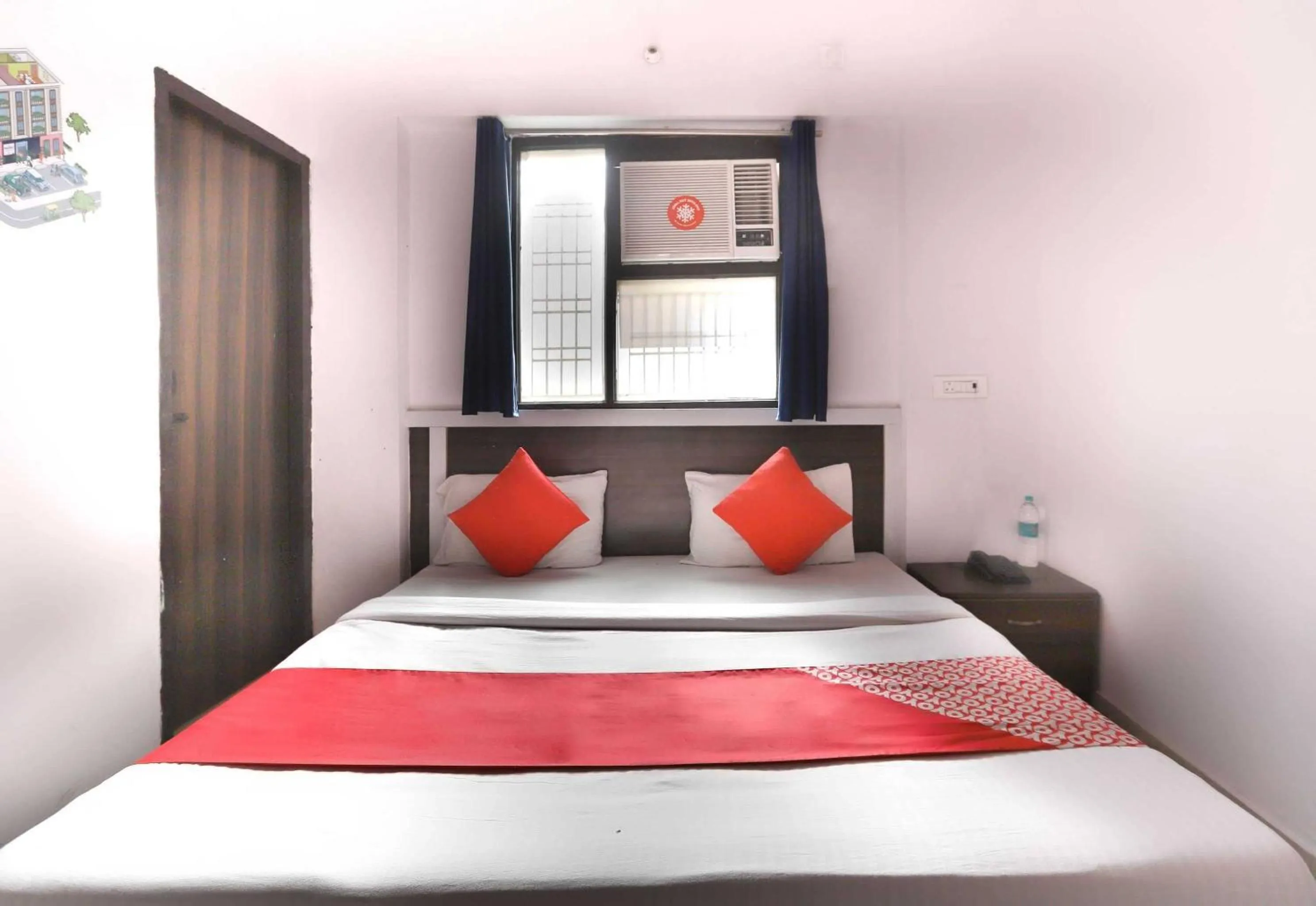 Bedroom in Hotel O Noida Villa