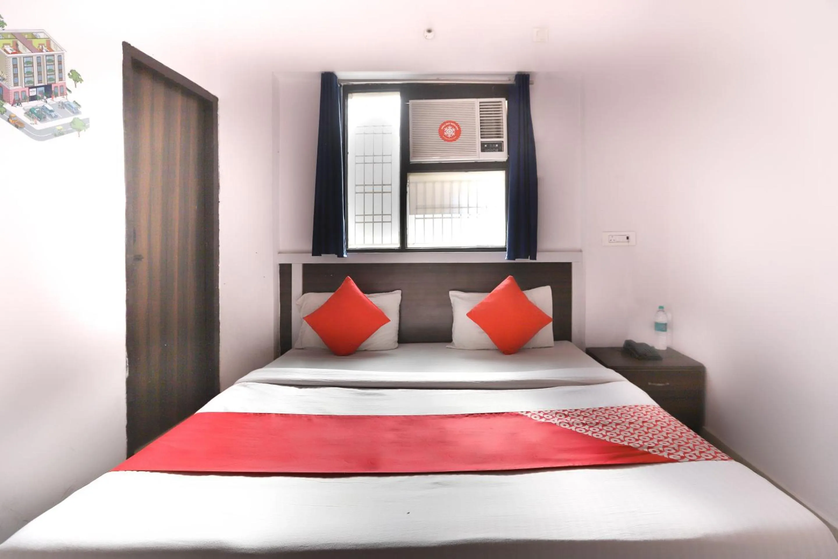 Bedroom in Hotel O Noida Villa