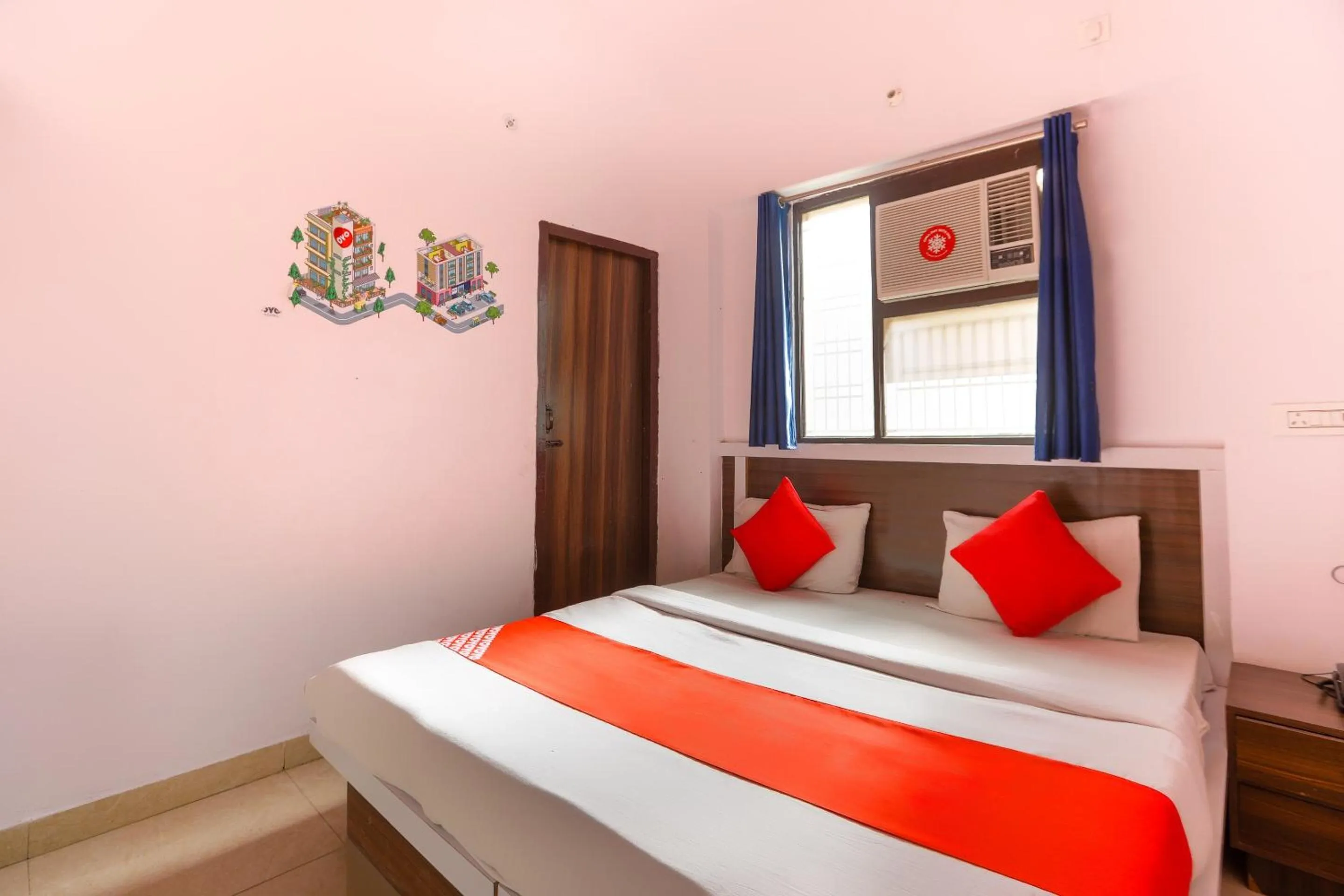 Bedroom in Hotel O Noida Villa