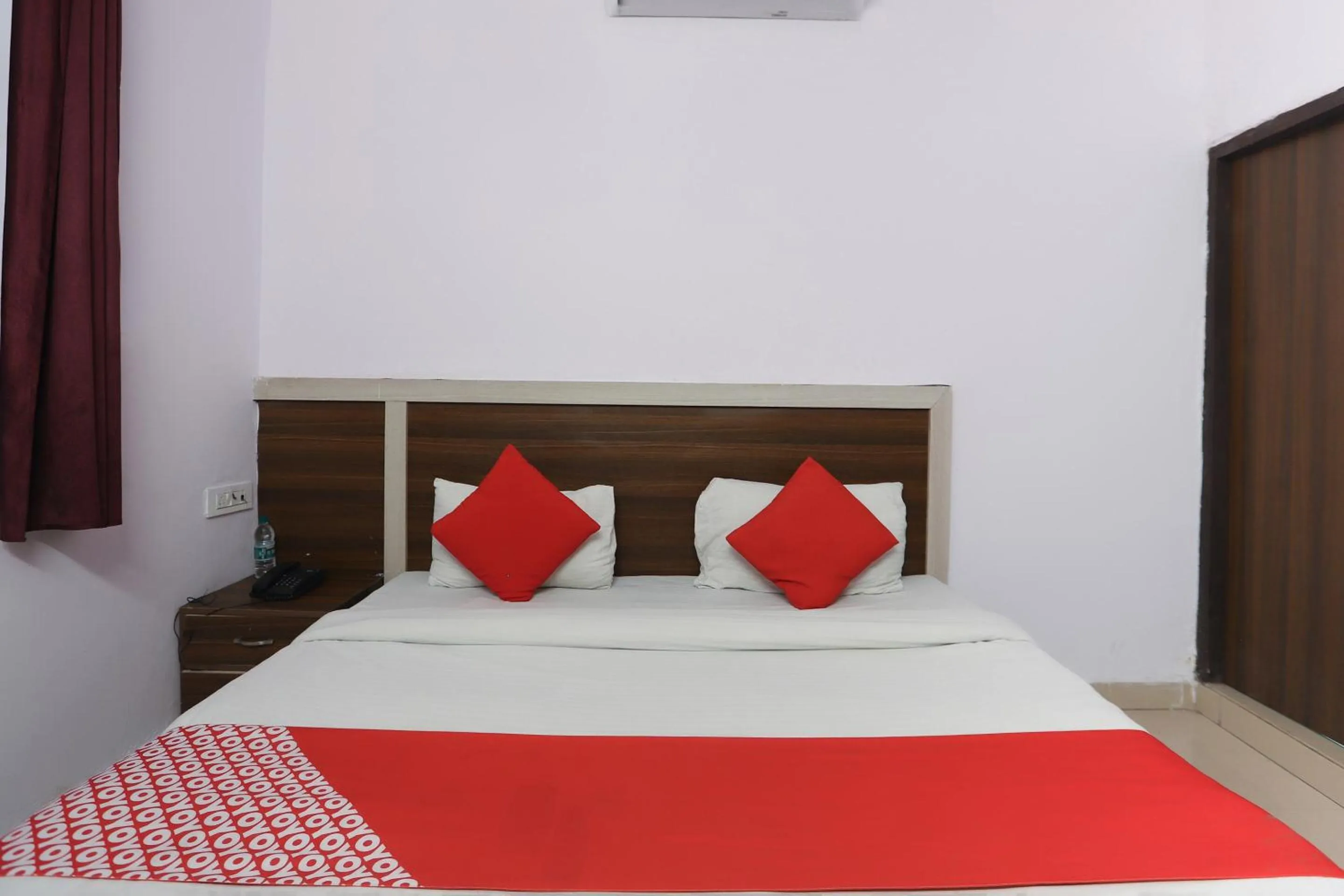 Bedroom in Hotel O Noida Villa