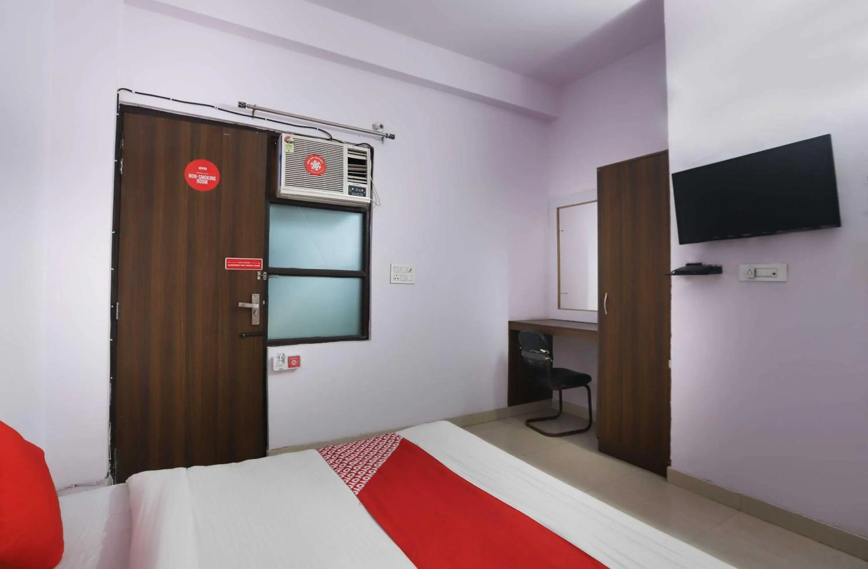 Bedroom in Hotel O Noida Villa