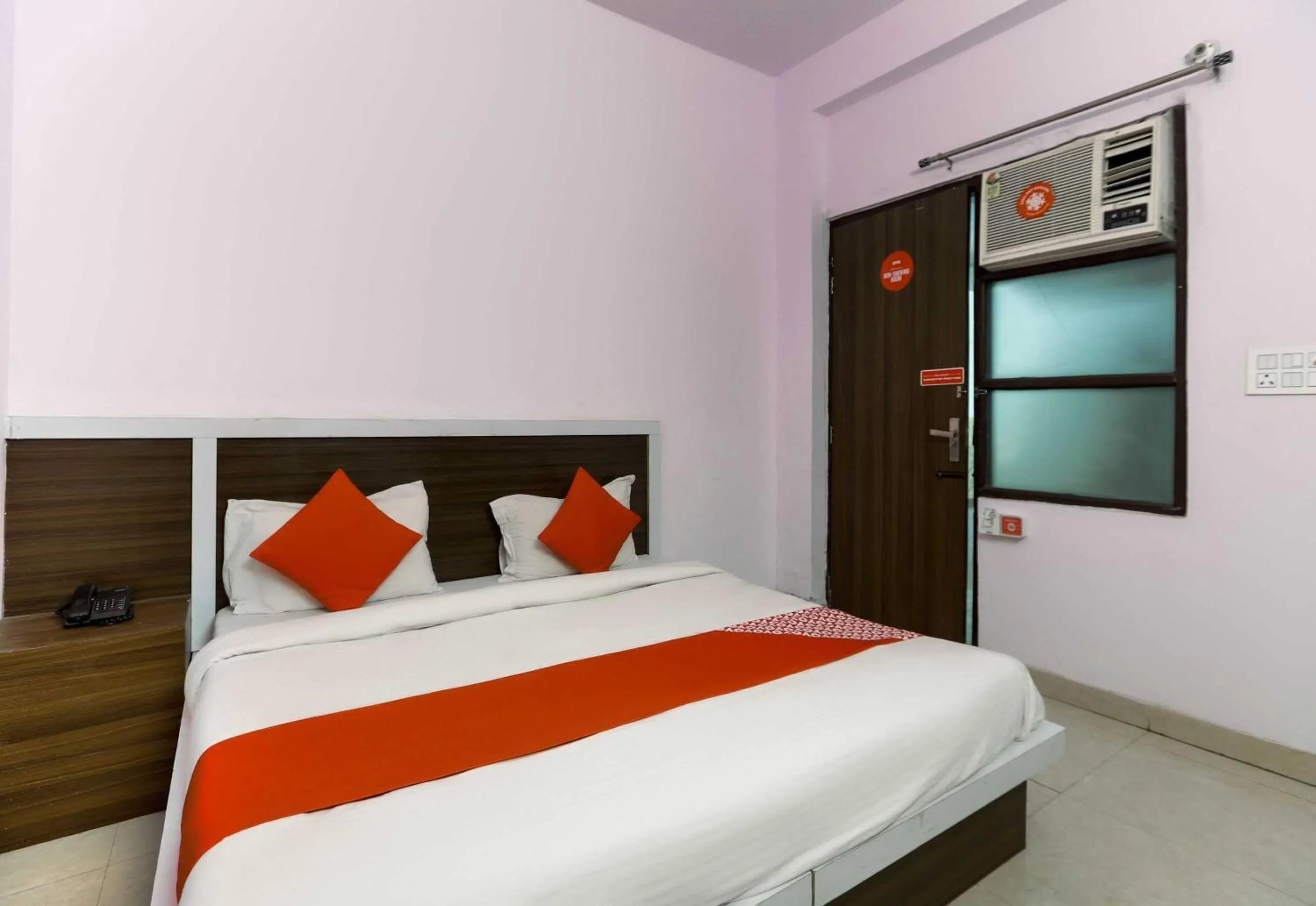 Bedroom in Hotel O Noida Villa