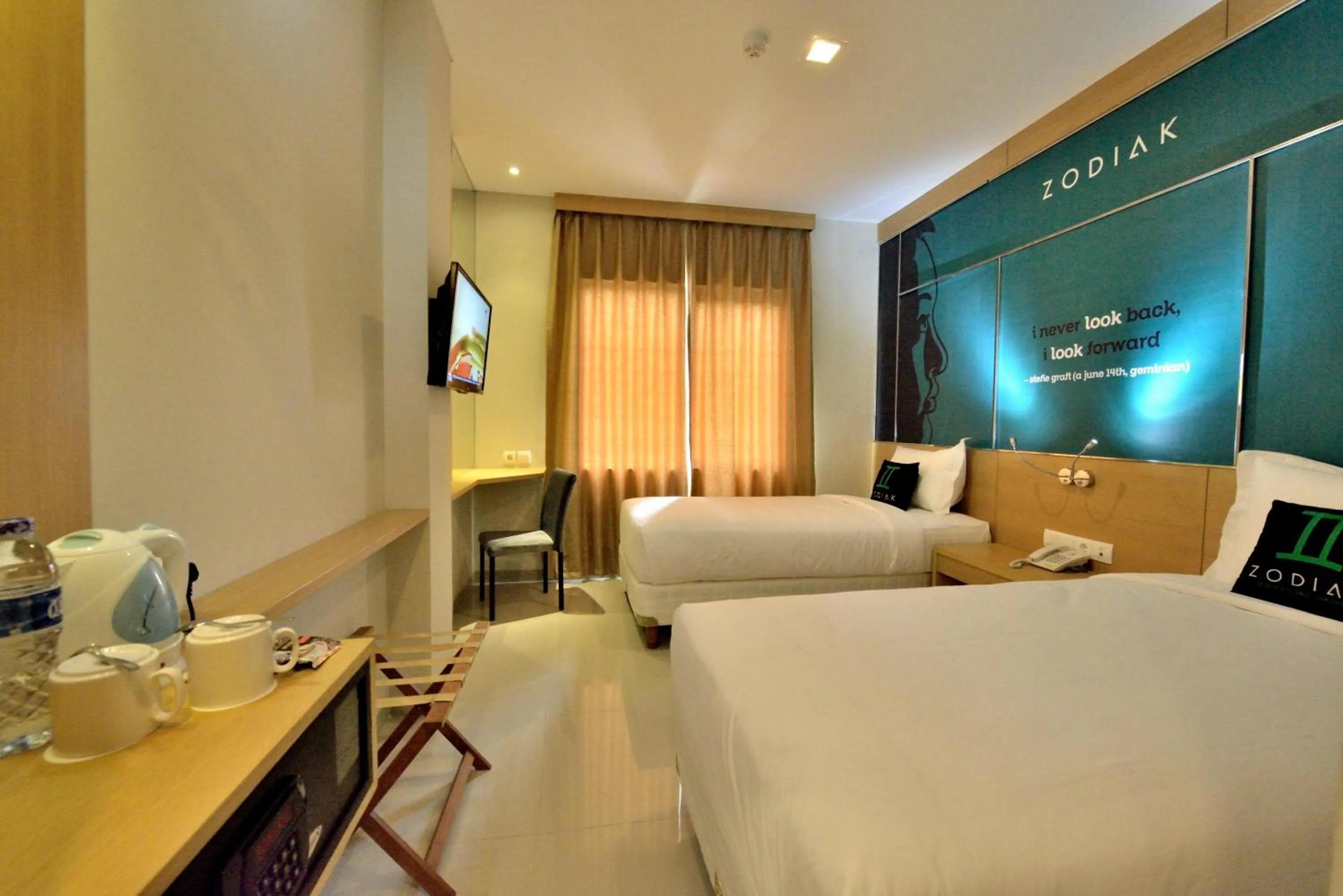 Photo of the whole room, Bed in Zodiak MT Haryono by KAGUM Hotels