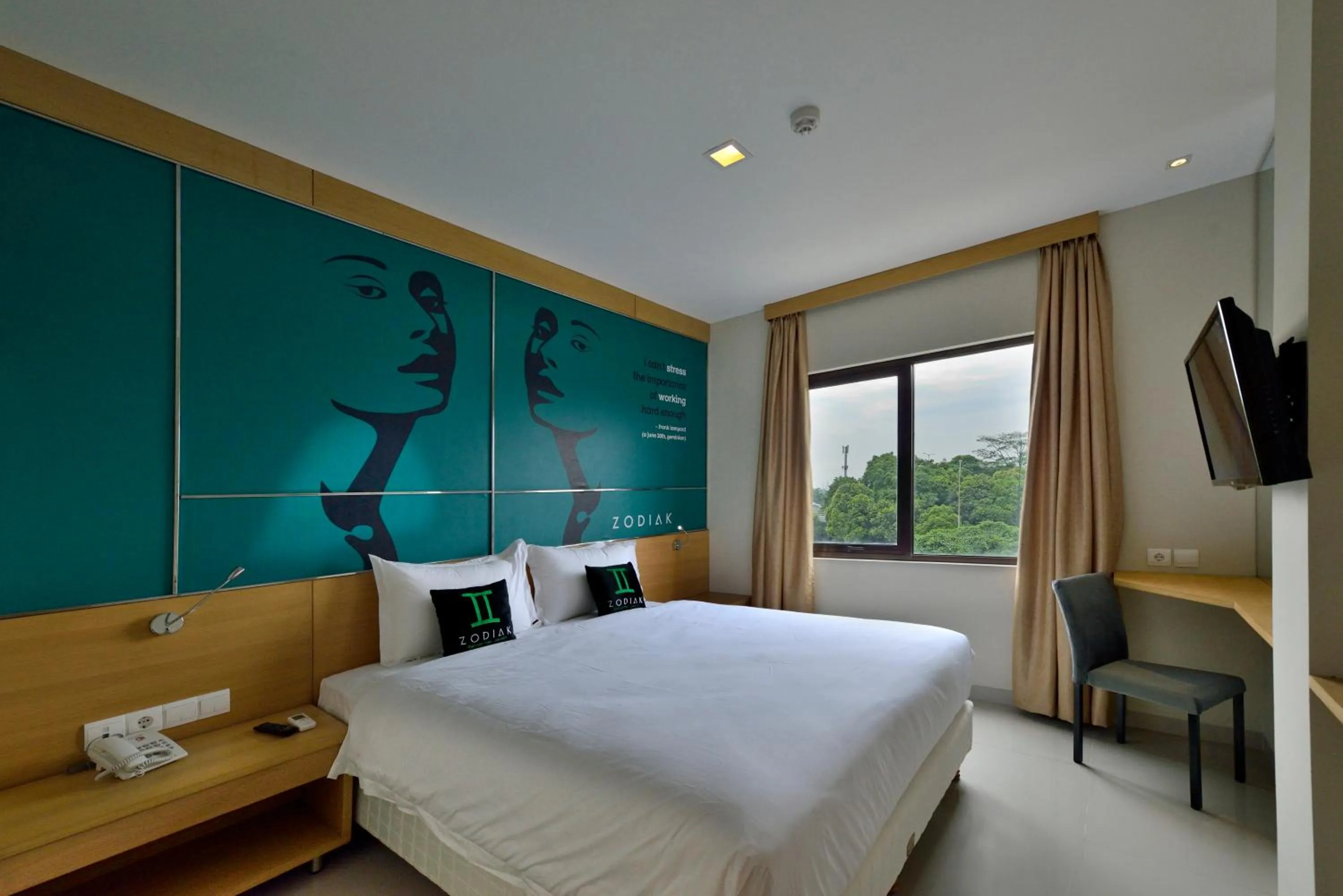 Bed in Zodiak MT Haryono by KAGUM Hotels