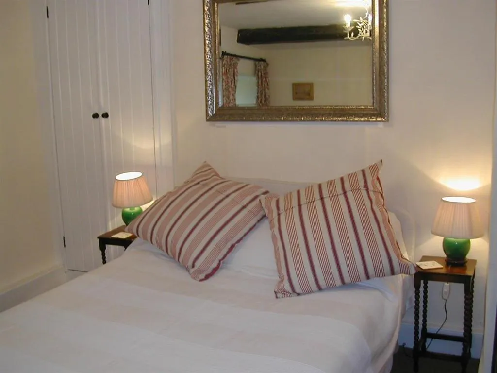 Bedroom, Bed in Alltybrain Farm Cottages