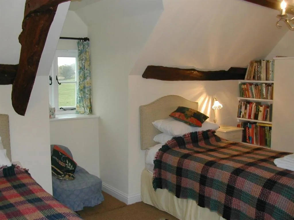 Bedroom, Bed in Alltybrain Farm Cottages