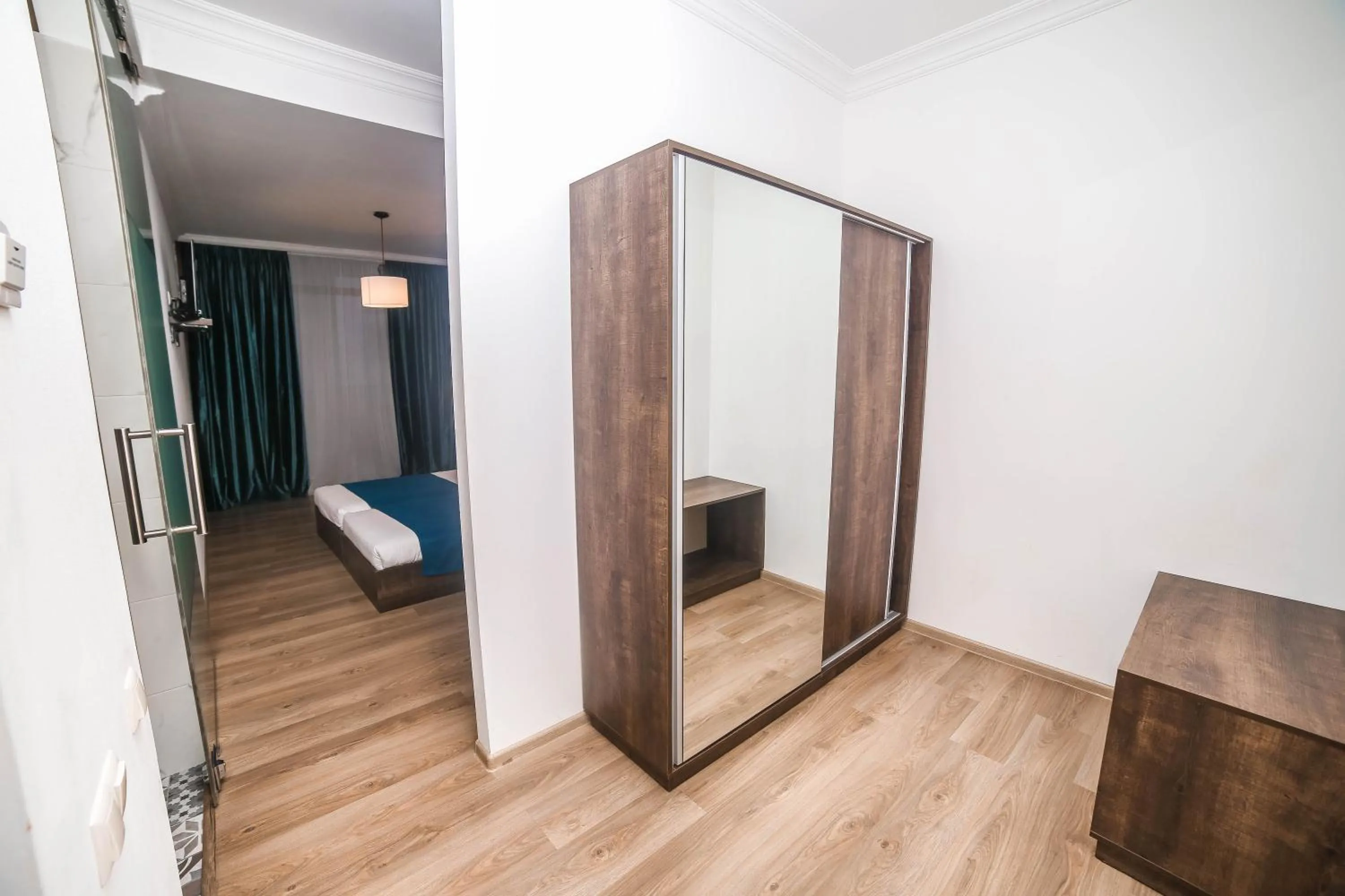 Communal lounge/ TV room, Bed in Tbilisi View Hotel