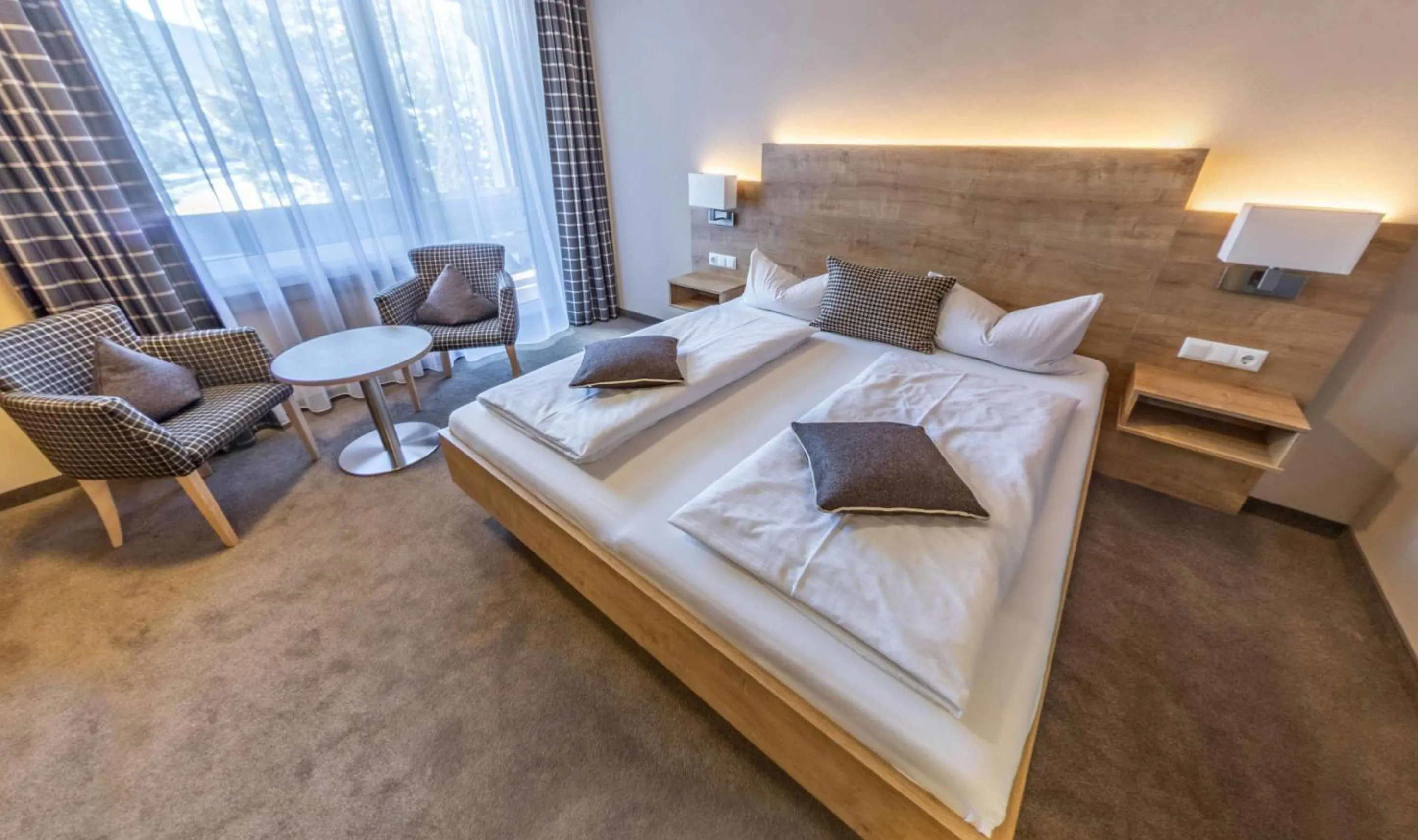 Photo of the whole room, Bed in Hotel Quellenhof