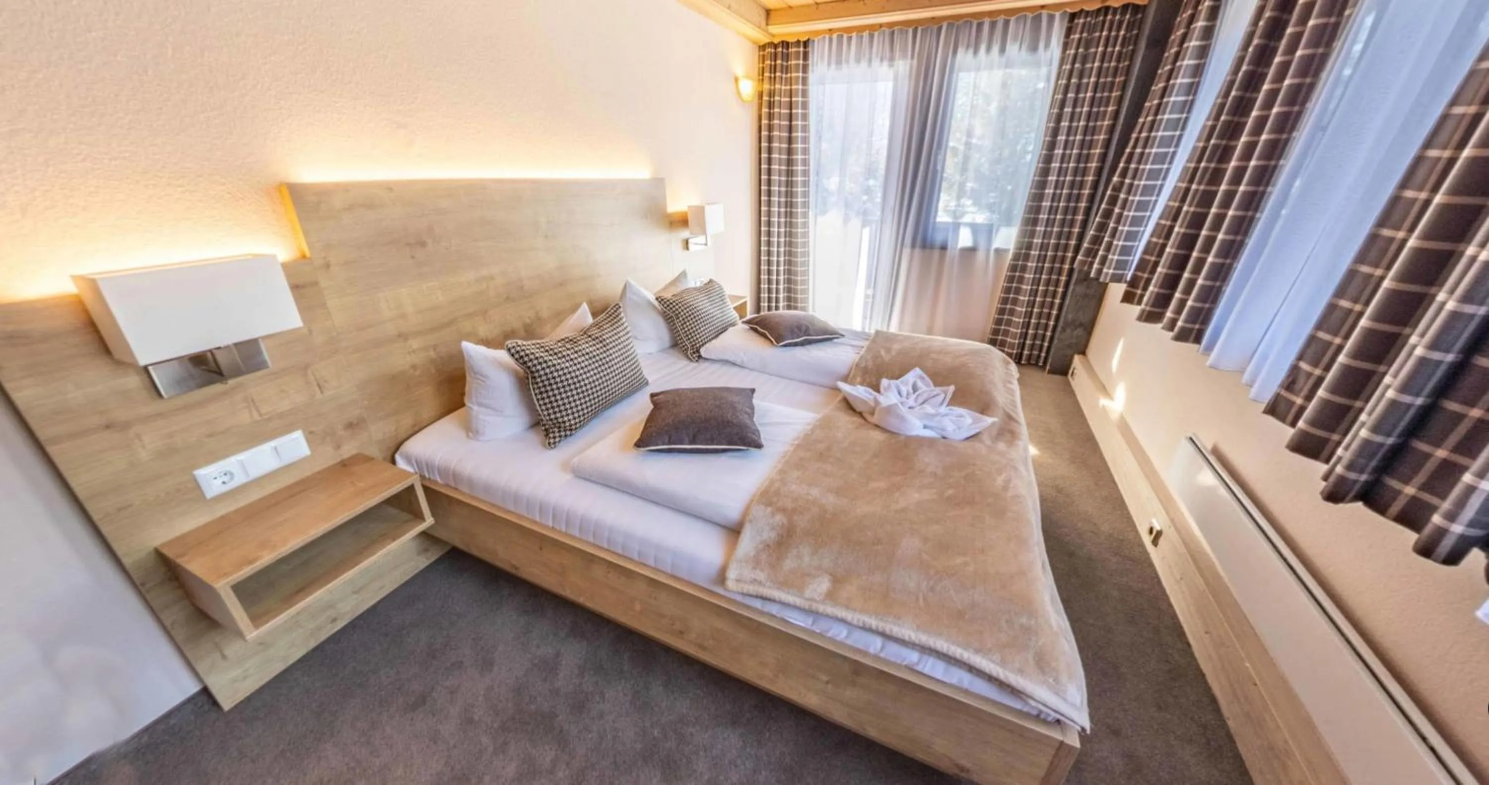 Photo of the whole room, Bed in Hotel Quellenhof