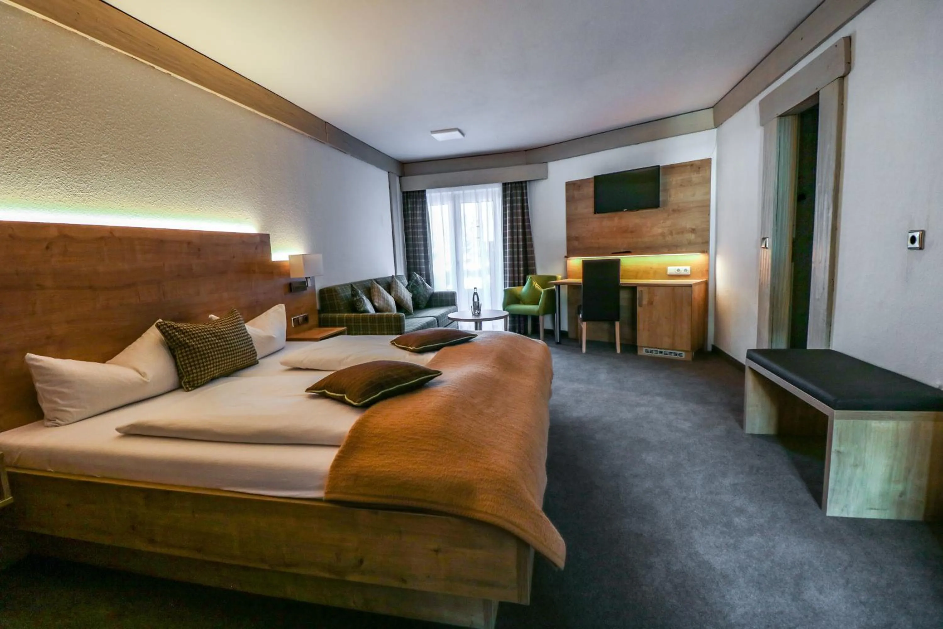 Photo of the whole room, Bed in Hotel Quellenhof