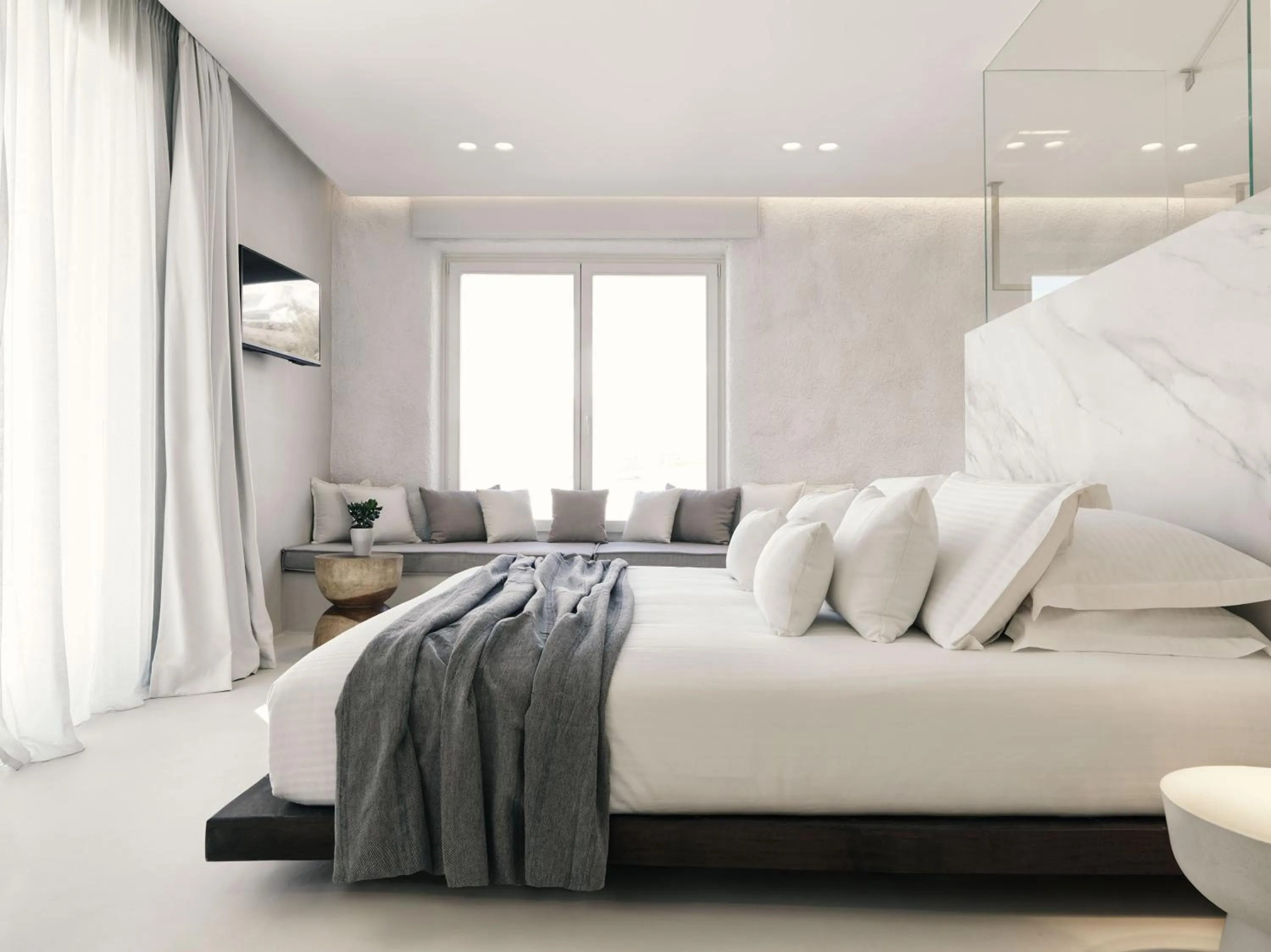 Bed in Mykonos Earth Suites