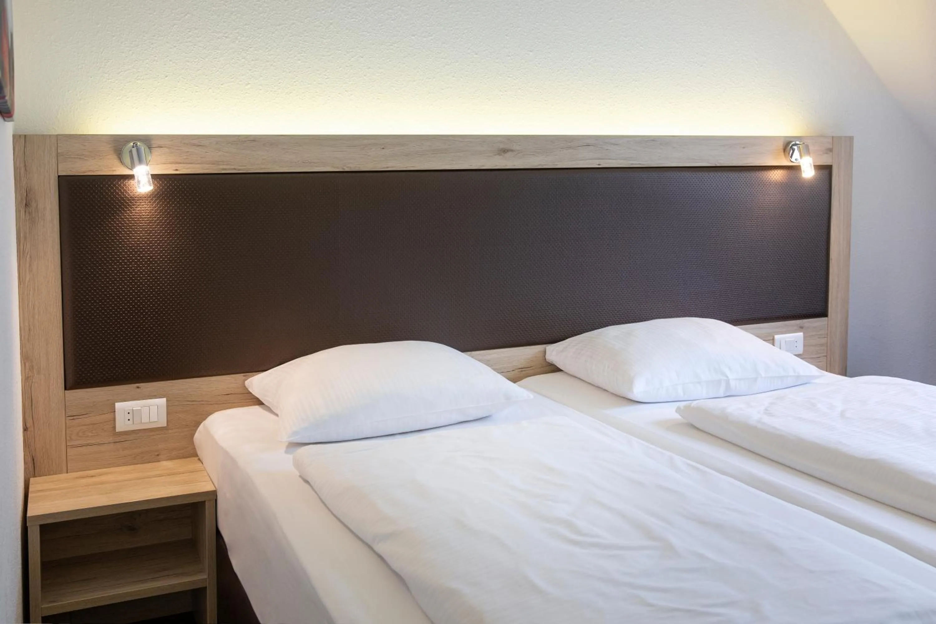 Photo of the whole room, Bed in ACHAT Hotel Monschau