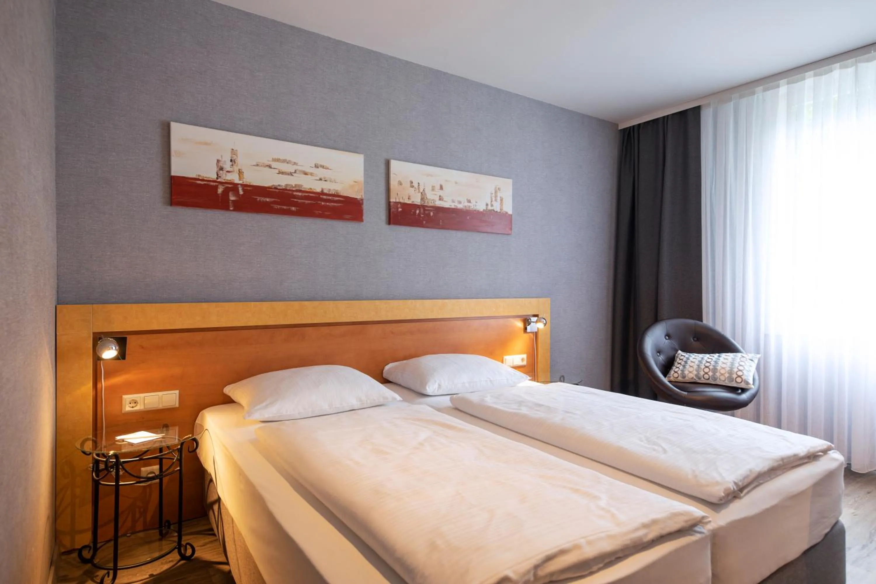 Photo of the whole room, Bed in ACHAT Hotel Monschau