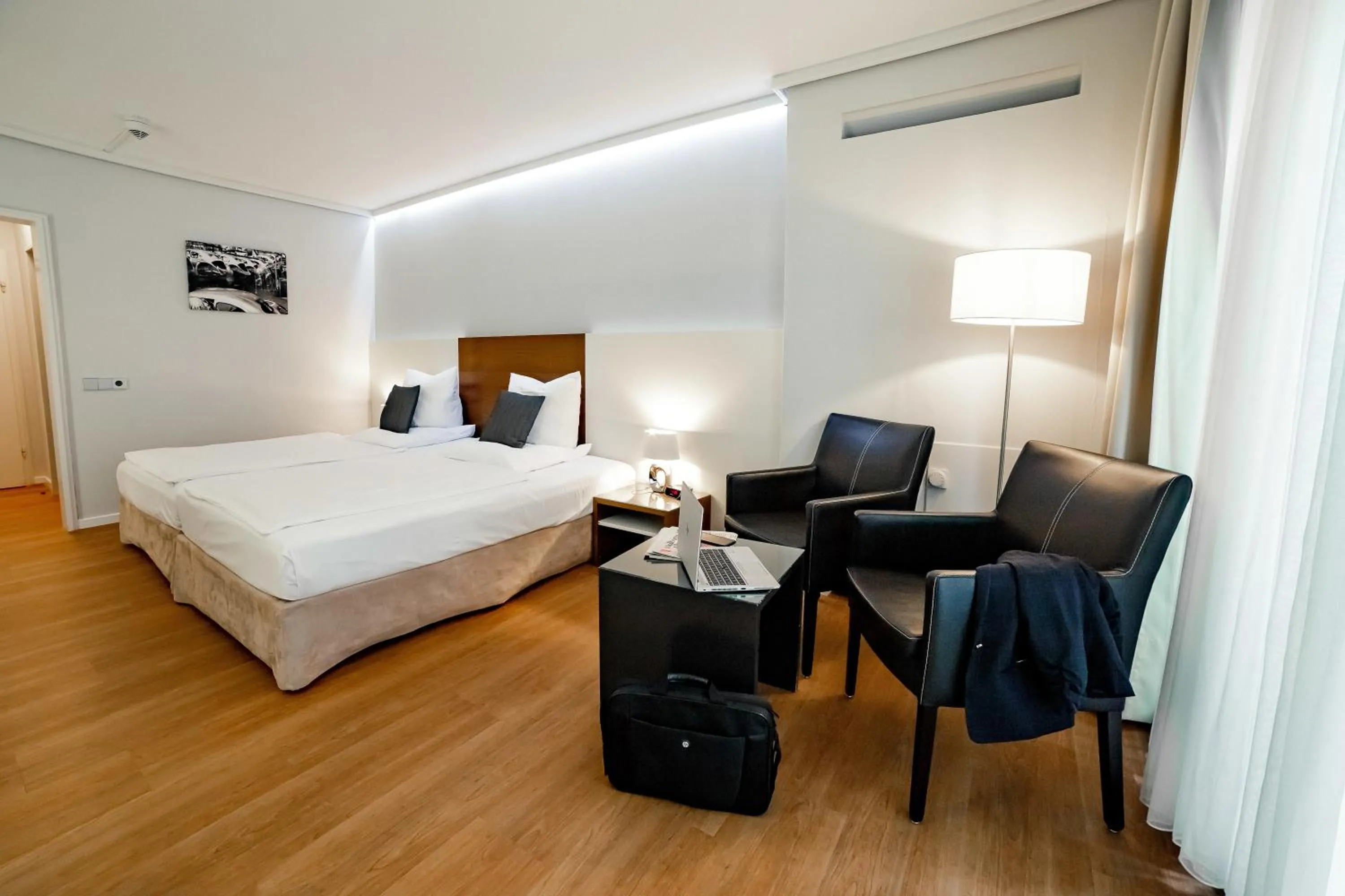 Seating area, Bed in Privathotel alte mühle Wolfsburg-Weyhausen