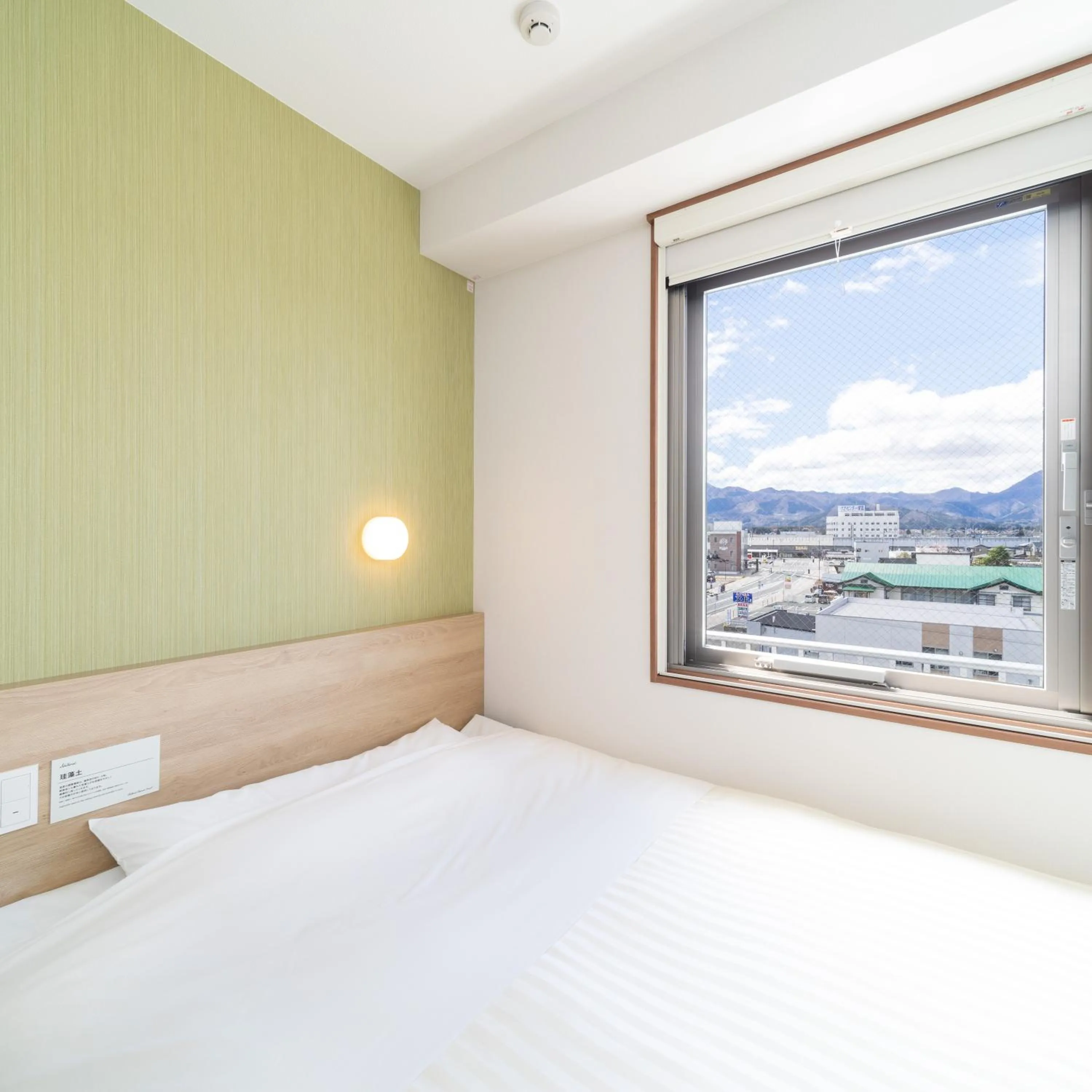 Bed in Super Hotel Yahaba Station East Exit