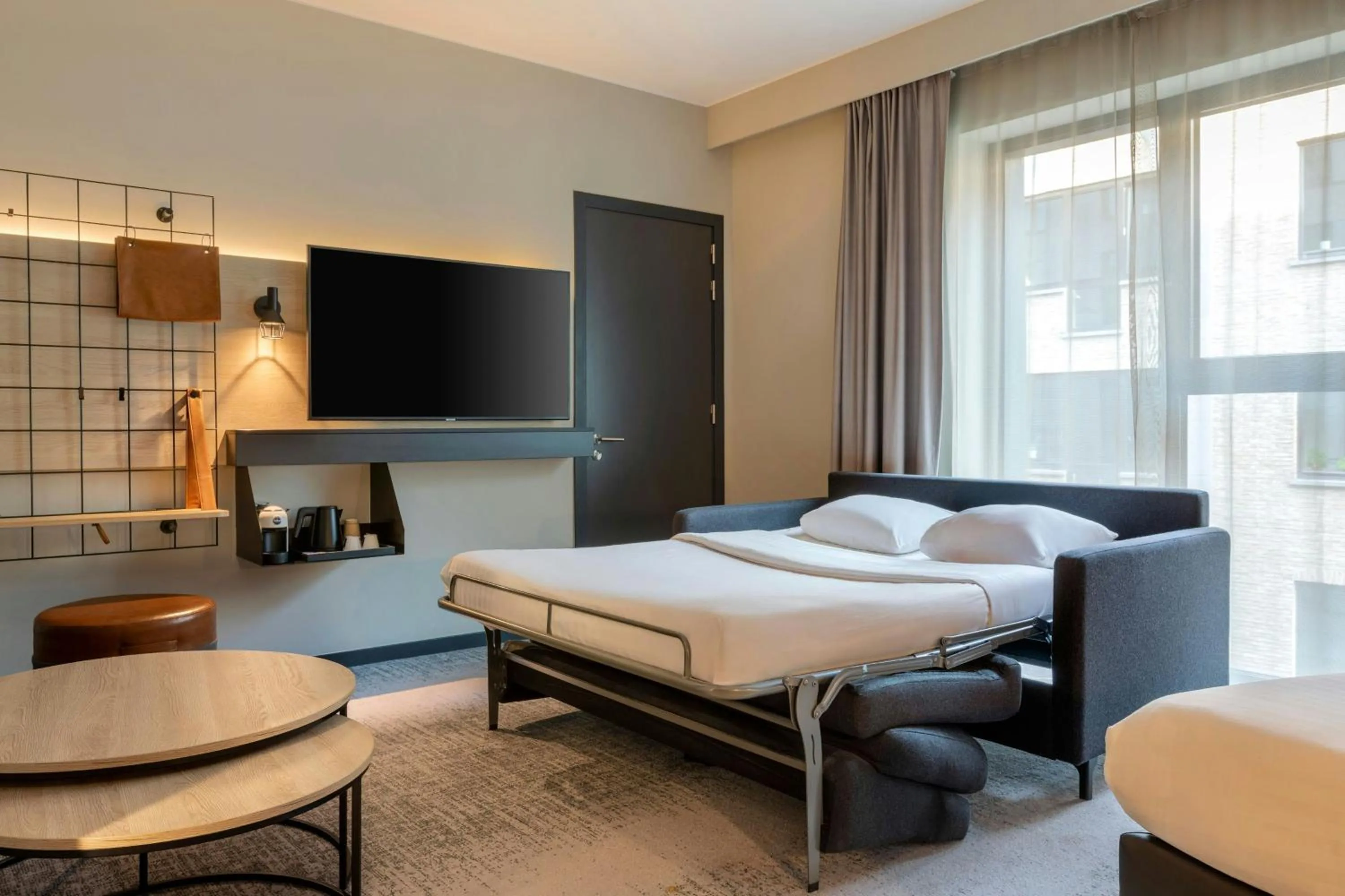 Photo of the whole room, Bed in Moxy Brussels City Center
