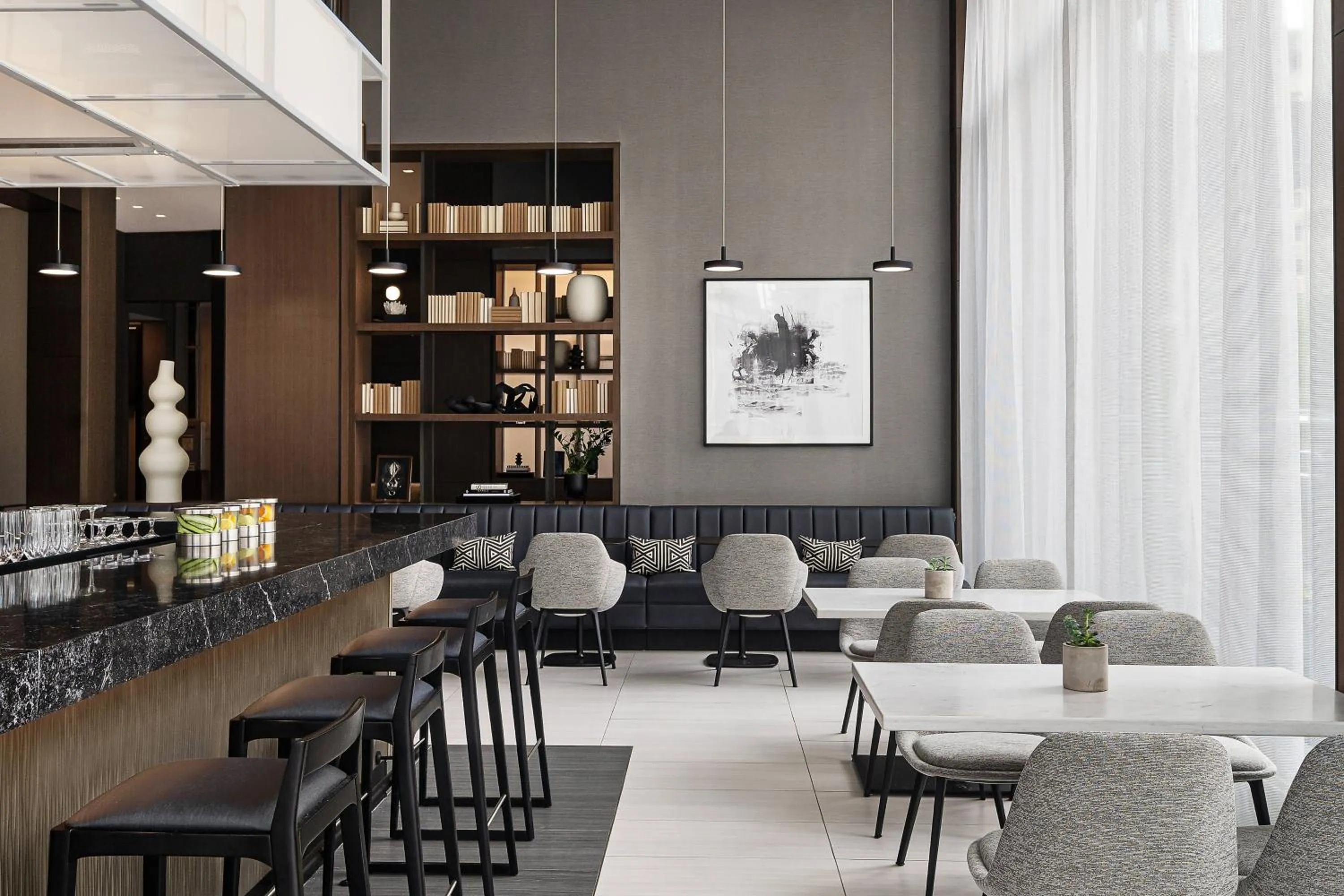 Lounge or bar in AC Hotel by Marriott Little Rock Downtown