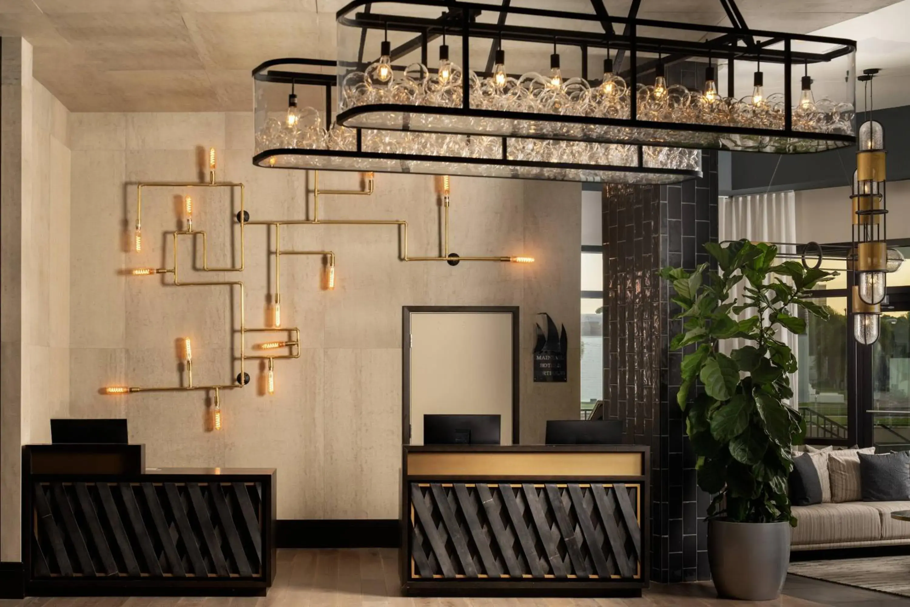 Lobby or reception in Luminary Hotel & Co., Autograph Collection Lobby or reception in Luminary Hotel & Co., Autograph Collection