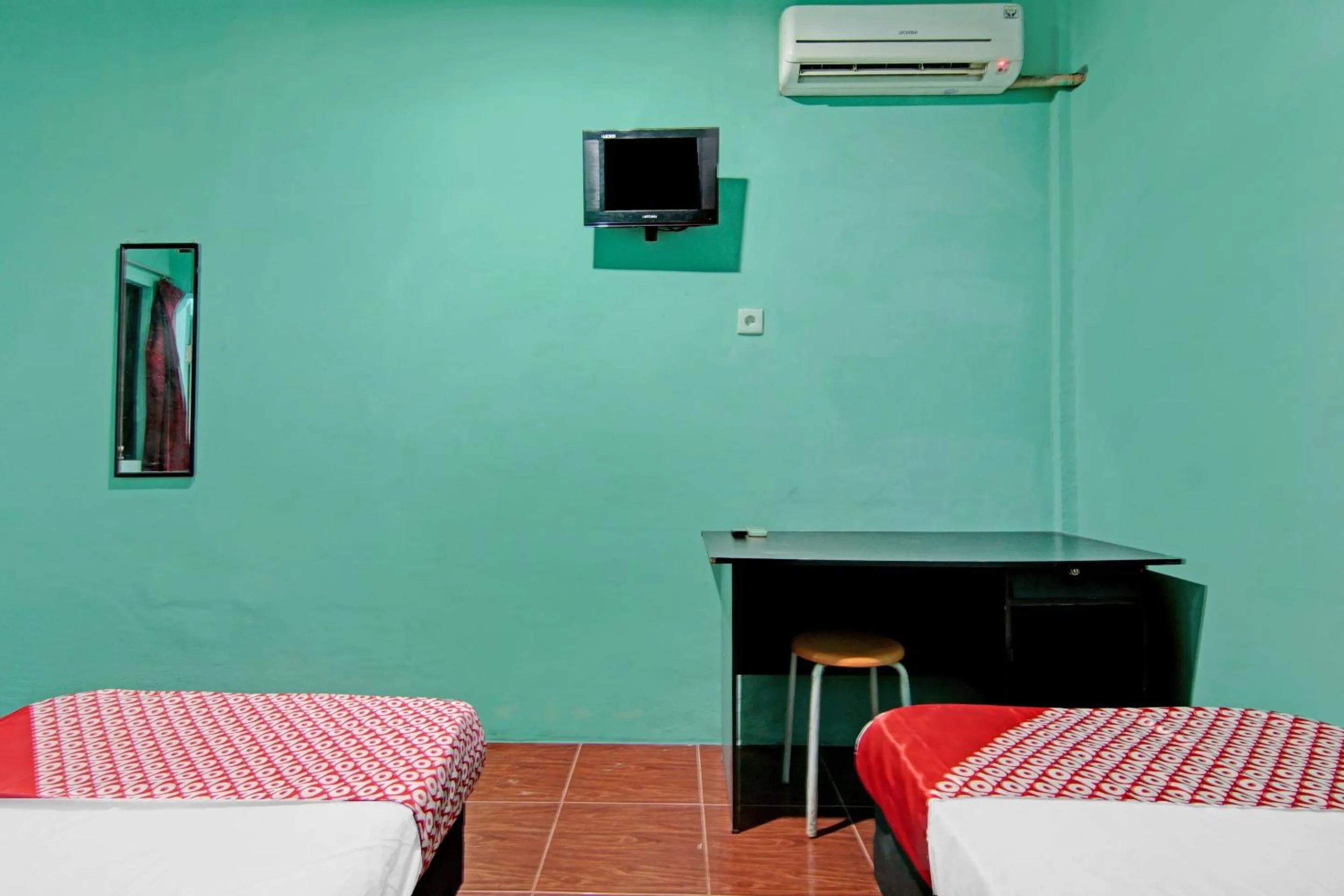 Bedroom in Hotel O Homestay 22 Syariah