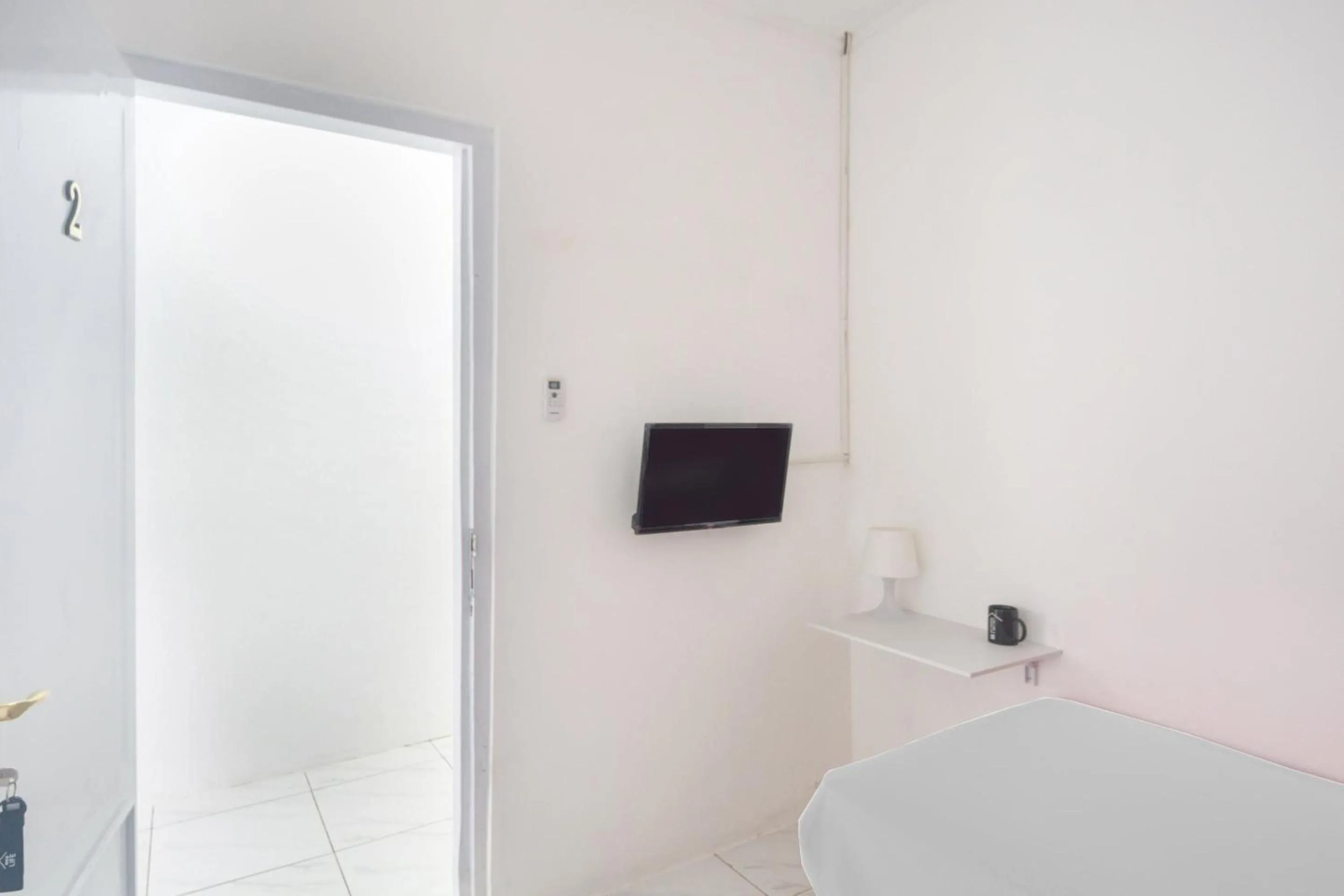 Bedroom in OYO Life 3055 Rumah Enin