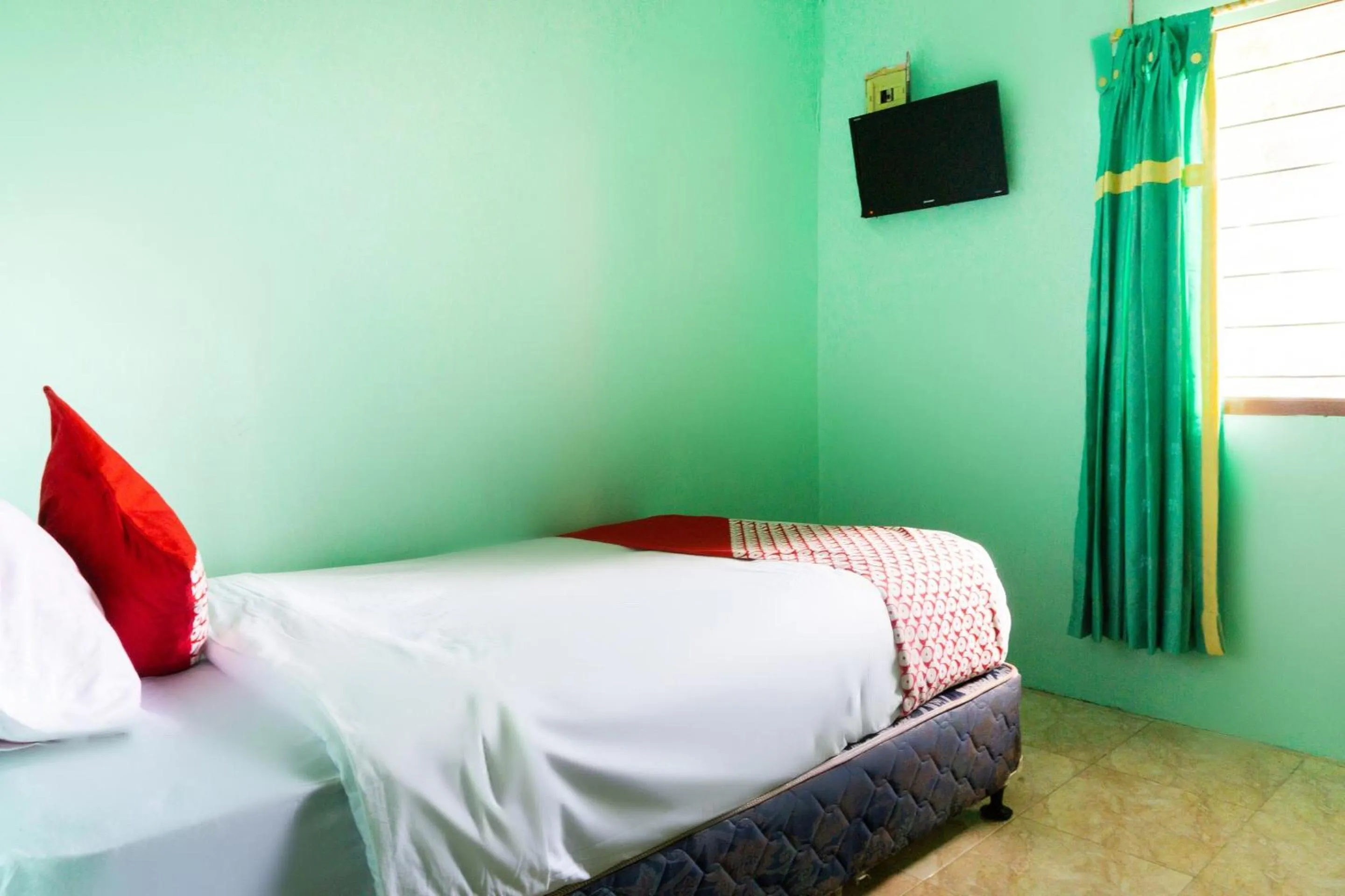 Bedroom, Bed in Hotel O Semarapura Homestay