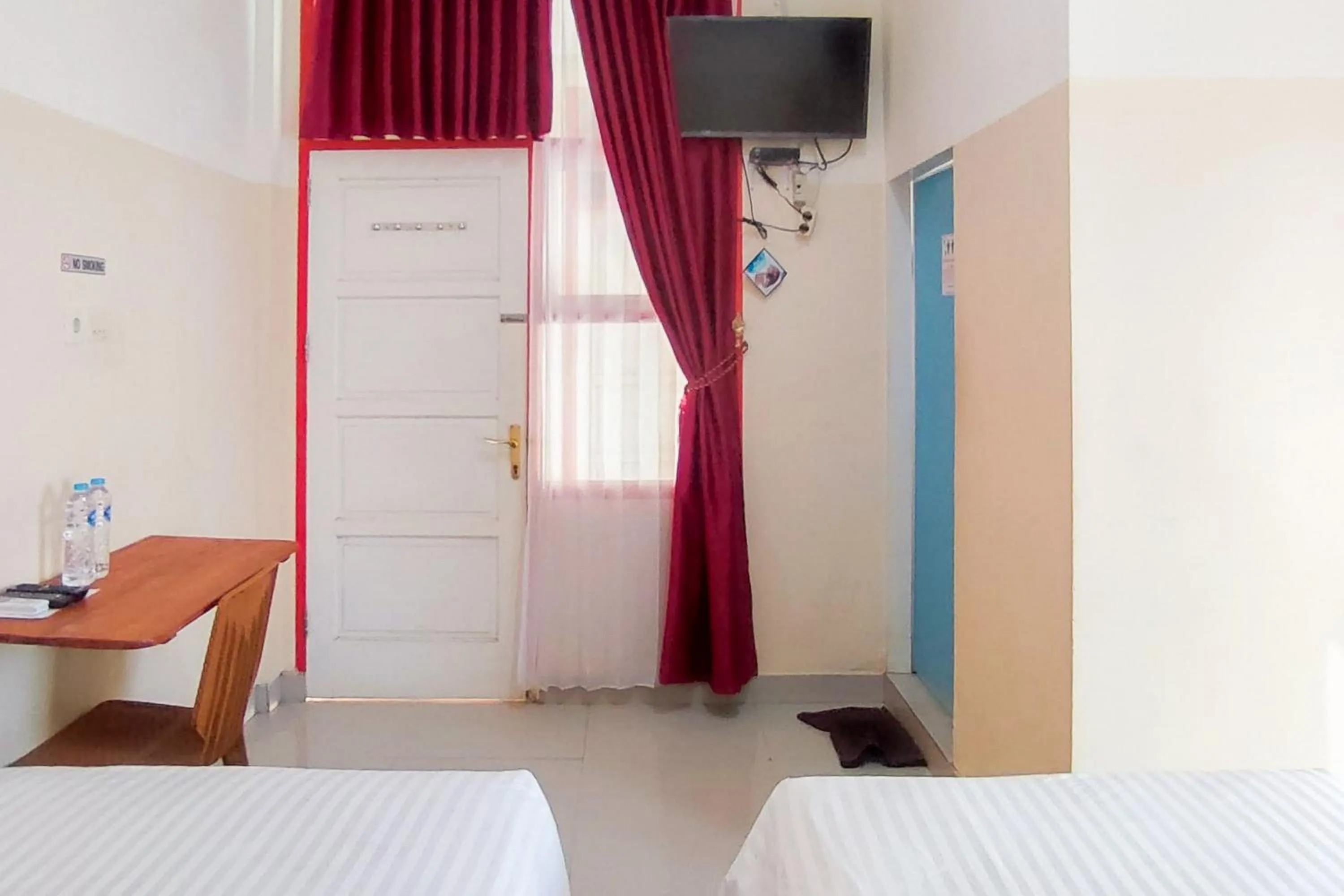Bedroom, Bed in Urbanview Hotel Falah Residence Syariah By RedDoorz