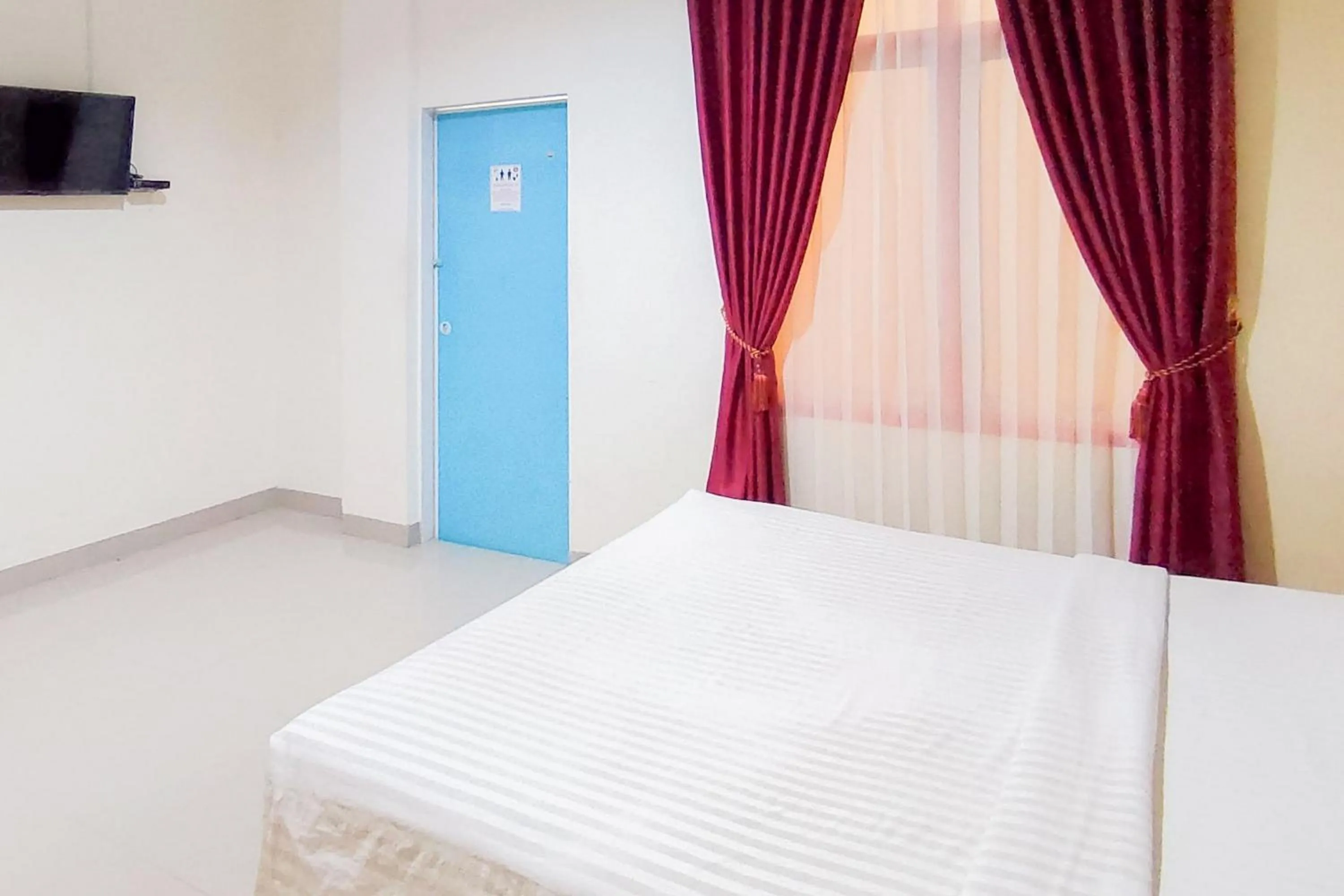 Bedroom, Bed in Urbanview Hotel Falah Residence Syariah By RedDoorz